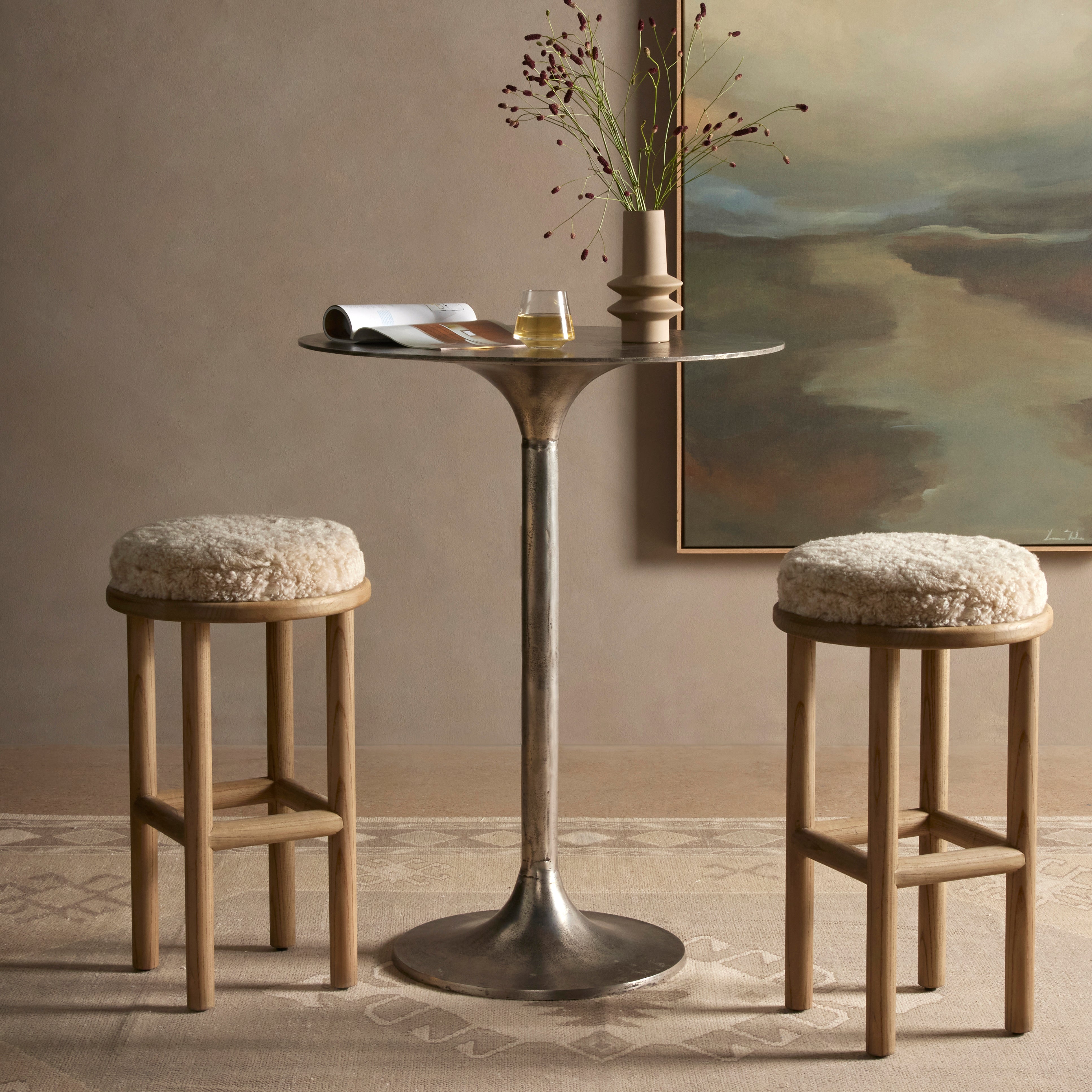 Featuring Saldino Stool by Four Hands at Amethyst Home. Bring a textural touch to the counter with the Saldino stool. Blonde-finished solid parawood supports rounded seating of soft beige shearling for comfort and style alike.
Overall Dimensions: 17"W x 17"L x 26"HColors: Blonde Nettlewood, Beige ShearlingMaterials: Solid Nettlewood, Shearling Weight: 15.21. Amethyst Home provides interior design, new home construction design consulting, vintage area rugs, and lighting in the San Diego metro area.