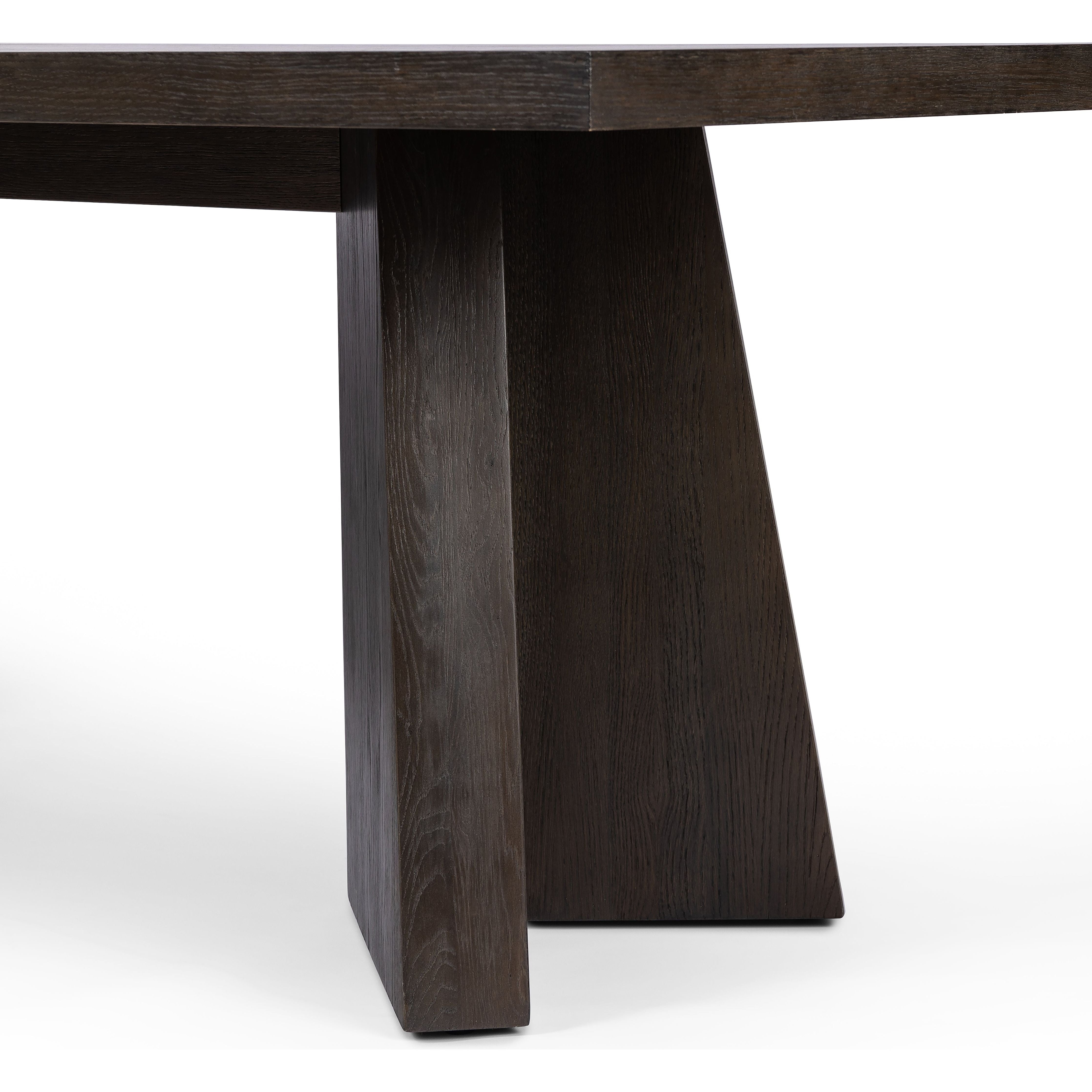 Made from oak and finished in a rich espresso, bold, angular shaping brings major impact to the dining room. Clean, classic lines suit different design styles with ease, from modern to traditional. Seats 10 comfortably. Amethyst Home provides interior design, new construction, custom furniture, and area rugs in the Newport Beach metro area.