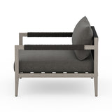 Featuring Sherwood Grey/Charcoal Outdoor Chair by Four Hands at Amethyst Home. Modern materials ready a stylish silhouette for the outdoors. Weathered grey teak forms a clean frame for UV-resistant and water-repellent Sunproof fabric. Cover or store indoors during inclement weather.Overall Dimensions: 33"W x 34.25"L x 30"H
Collection: SolanoColors: Venao Charcoal ,Weathered Grey-. Amethyst Home provides interior design, new construction, custom furniture, and area rugs in the Park City metro area.