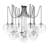 Featuring Spider Black Gunmetal Clear Ribbon Glass Cord Chandelier by Four Hands at Amethyst Home. Clear glass spheres float at varying lengths for a statement-making piece. Each globe is individually blown, shaped and sculpted by hand through a one-hour process. The finish on the brass frame is achieved through a specialized process that turns the brass. Amethyst Home provides interior design, new home construction design consulting, vintage area rugs, and lighting in the Laguna Beach metro area.