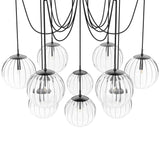 Featuring Spider Black Gunmetal Clear Ribbon Glass Cord Chandelier by Four Hands at Amethyst Home. Clear glass spheres float at varying lengths for a statement-making piece. Each globe is individually blown, shaped and sculpted by hand through a one-hour process. The finish on the brass frame is achieved through a specialized process that turns the brass i. Amethyst Home provides interior design, new home construction design consulting, vintage area rugs, and lighting in the Scottsdale metro area.