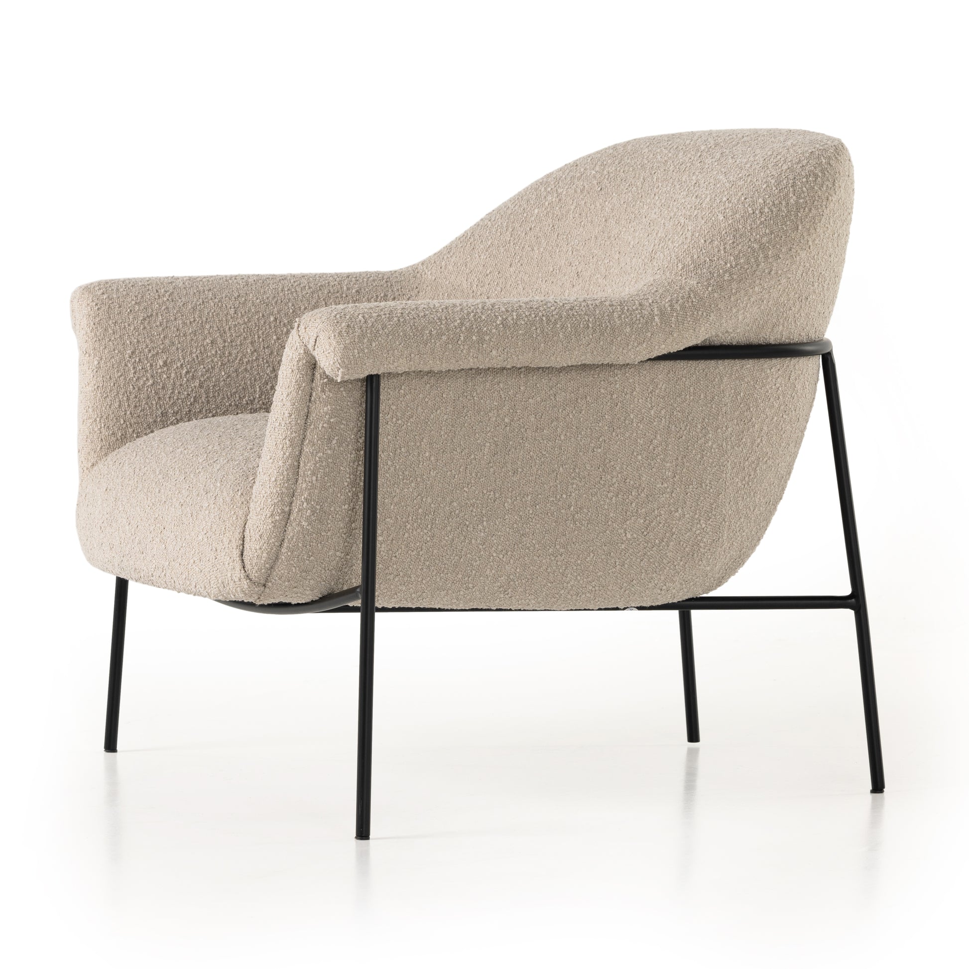 With a curvy silhouette and classic rolled arms, soft boucle lends a fresh feel to comfortable accent seating, with an airy iron cradle base for a beautiful balance of scale. Performance fabrics are specially created to withstand spills, stains, high traffic and wear, ensuring long-term comfort and unmatched durability. Amethyst Home provides interior design, new construction, custom furniture, and area rugs in the Calabasas metro area.