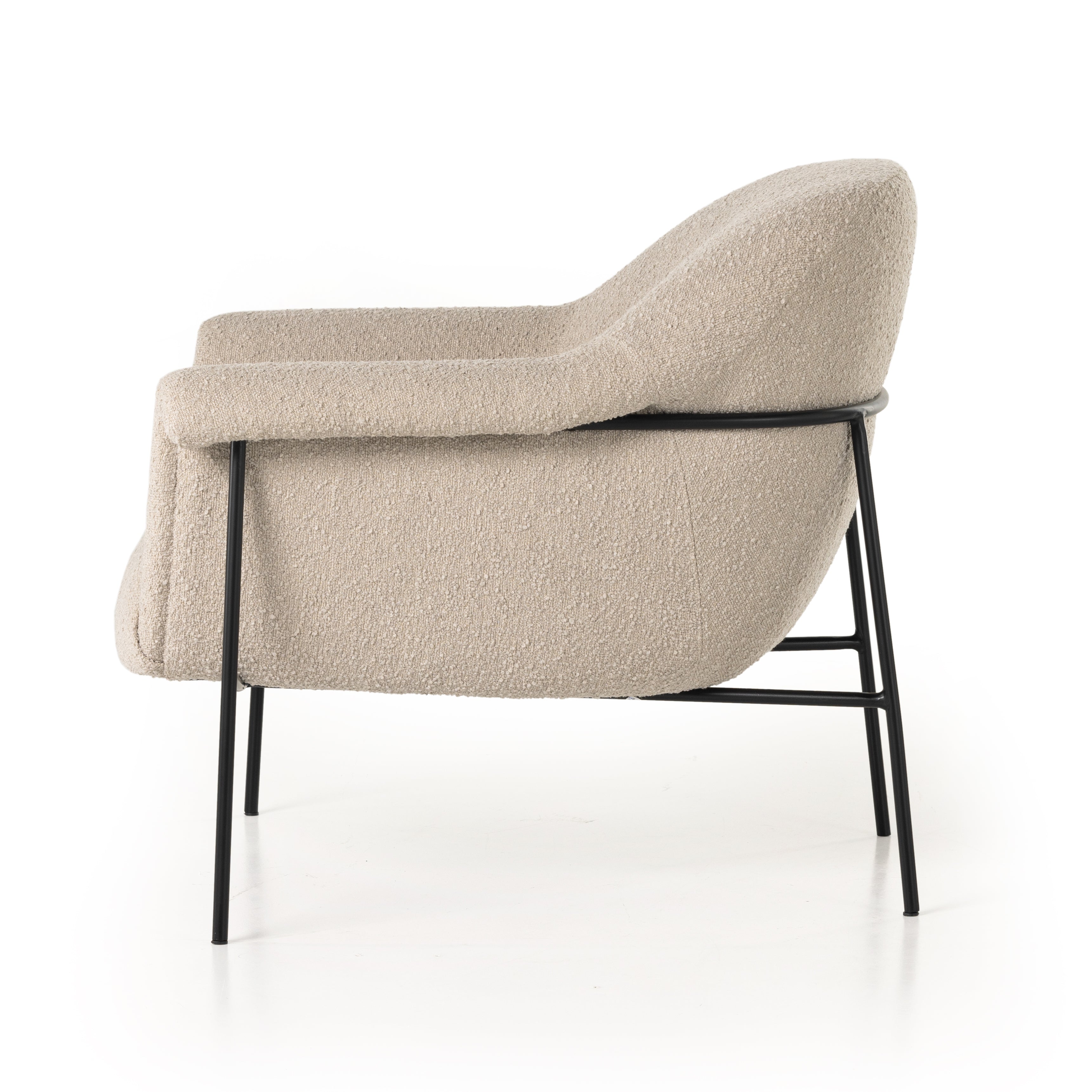 With a curvy silhouette and classic rolled arms, soft boucle lends a fresh feel to comfortable accent seating, with an airy iron cradle base for a beautiful balance of scale. Performance fabrics are specially created to withstand spills, stains, high traffic and wear, ensuring long-term comfort and unmatched durability. Amethyst Home provides interior design, new construction, custom furniture, and area rugs in the Winter Garden metro area.
