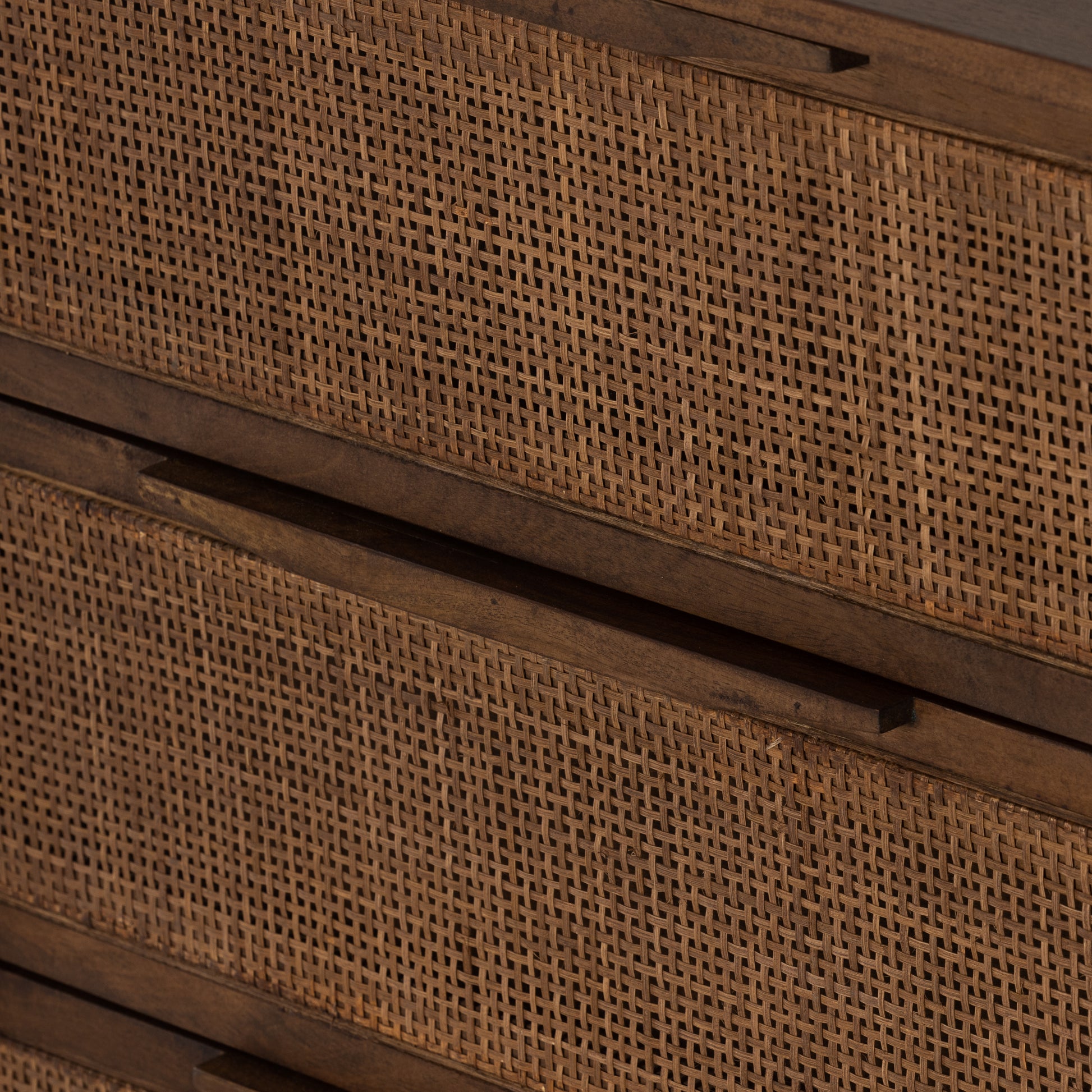 Sydney Brown Wash Drawer Dresser encases six spacious drawers of woven cane, for a textural look with monochromatic vibes. Amethyst Home provides interior design services, furniture, rugs, and lighting in the Dallas metro area.