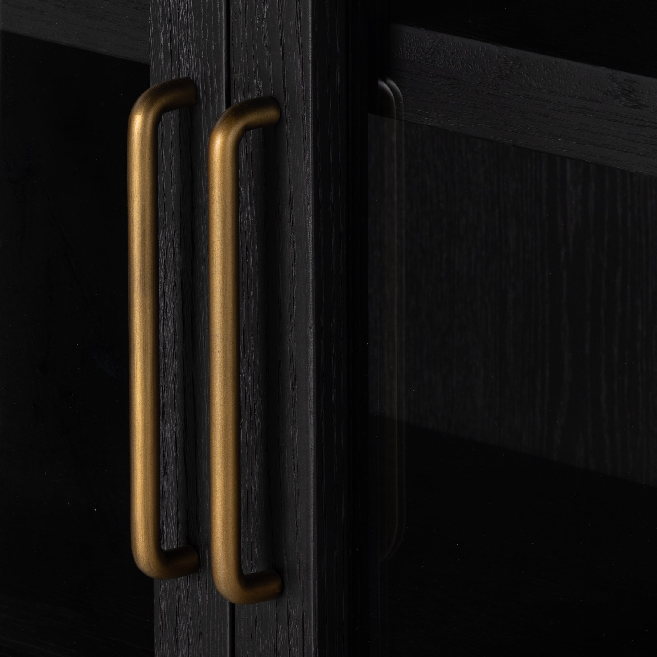 Featuring Tolle Drifted Matte Black Cabinet by Four Hands at Amethyst Home. Made from black-finished solid oak, French-inspired cabinetry features an arched top, spacious interior and a clear glass front for storage and display.
Collection: IrondaleColors: Antique Brass ,Drifted BlackMaterials: Iron ,Solid Oak Weight: 185.3 lbsOverall Dimensions: 38"W x 19"L x 84"HVolume: 51.74 c. Amethyst Home provides interior design, new construction, custom furniture, and area rugs in the Nashville metro area.