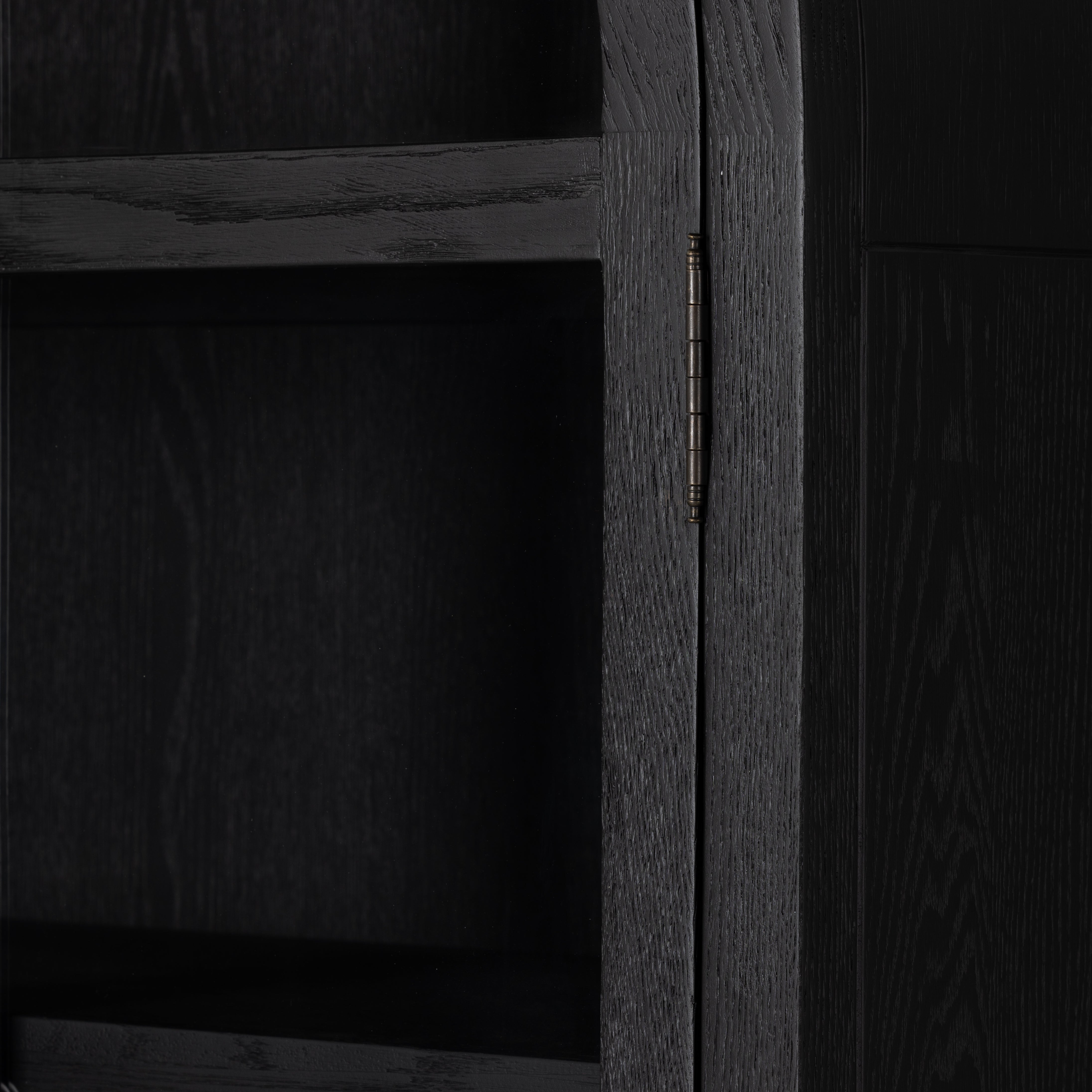 Featuring Tolle Drifted Matte Black Cabinet by Four Hands at Amethyst Home. Made from black-finished solid oak, French-inspired cabinetry features an arched top, spacious interior and a clear glass front for storage and display.
Collection: IrondaleColors: Antique Brass ,Drifted BlackMaterials: Iron ,Solid Oak Weight: 185.3 lbsOverall Dimensions: 38"W x 19"L x 84"HVolume: 51.. Amethyst Home provides interior design, new construction, custom furniture, and area rugs in the Newport Beach metro area.