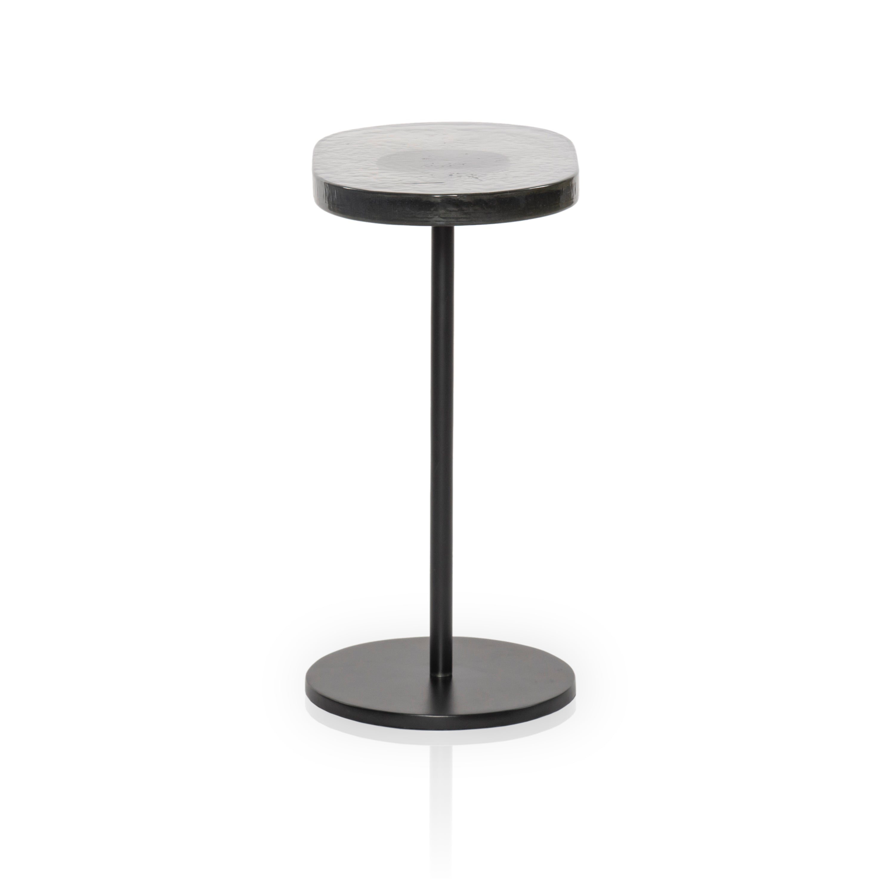 Featuring Vinia Light Blue Cast Glass End Table by Four Hands at Amethyst Home. A slim-profile end table pairs a simple iron base with an oval tabletop of hand-cast recycled glass in a soft, smoky blue.
Collection: MarlowColors: Light Blue Cast Glass ,Iron Matte BlackMaterials: Cast Glass ,IronOverall Dimensions: 12.75"W x 8.25"L x 17"H Weight: 17.85 lbs. Amethyst Home provides interior design, new construction, custom furniture, and area rugs in the Dallas metro area.
