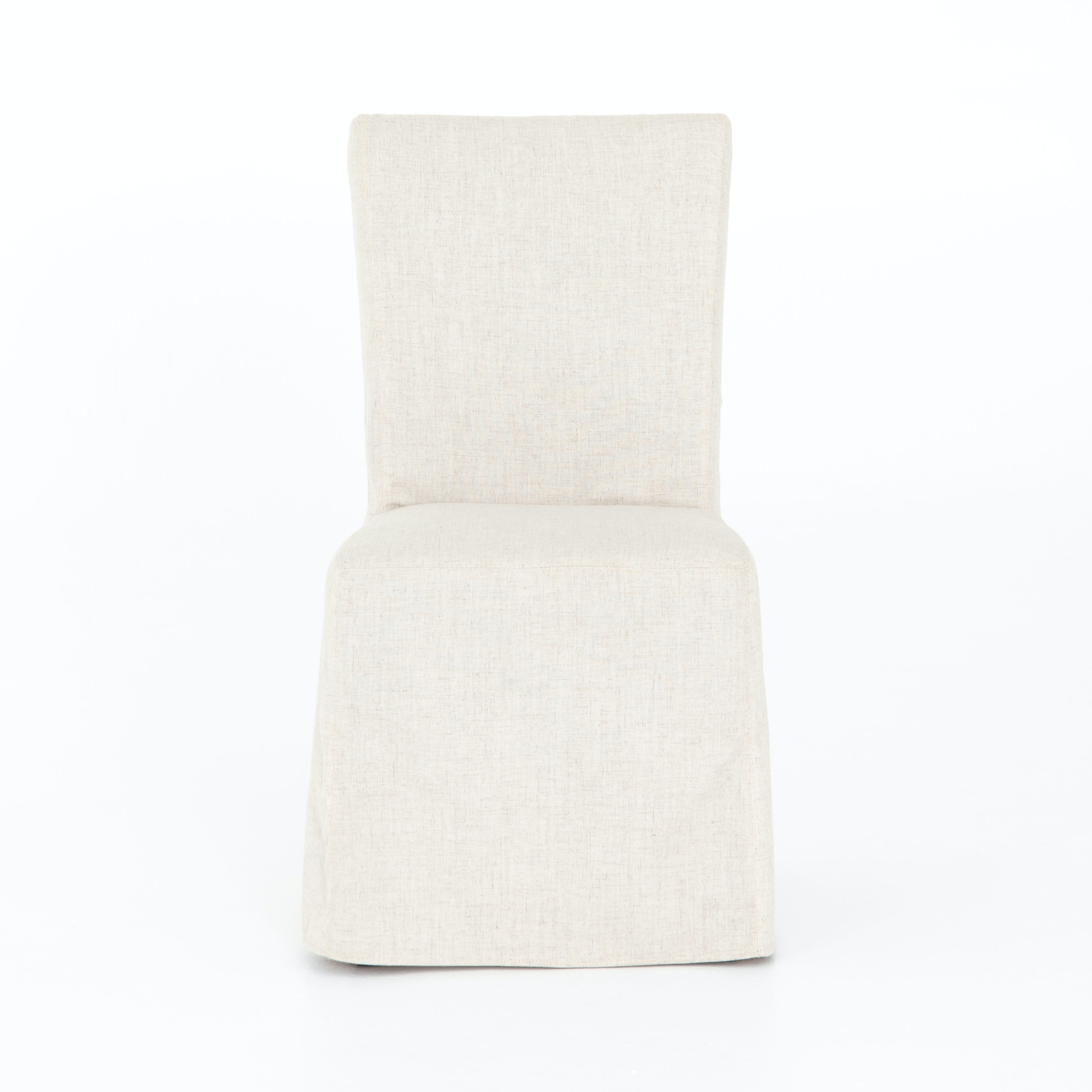 The slipcovered Vista Savile Flax Dining Chair delights with a tall, enticingly curved silhouette and ivory performance-grade fabric. Amethyst Home provides interior design, new construction, custom furniture, and rugs for the Omaha and Lincoln metro area.