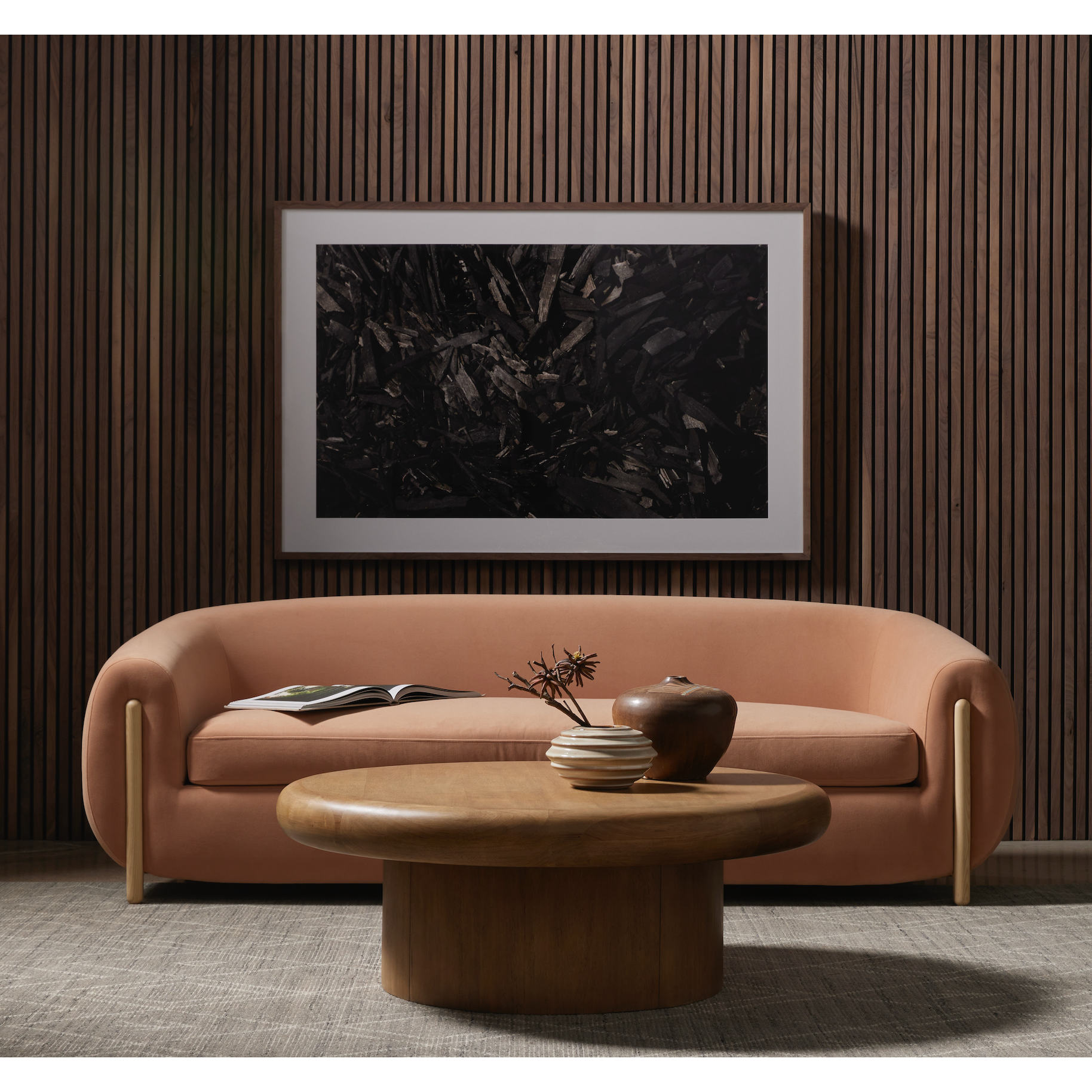 The Zach coffee table in burnished parawood features a pedestal-style base on a rounded tabletop with bullnose edging, for style and softness alike. Amethyst Home provides interior design, furniture, rugs, and design services in the Sacramento metro area.