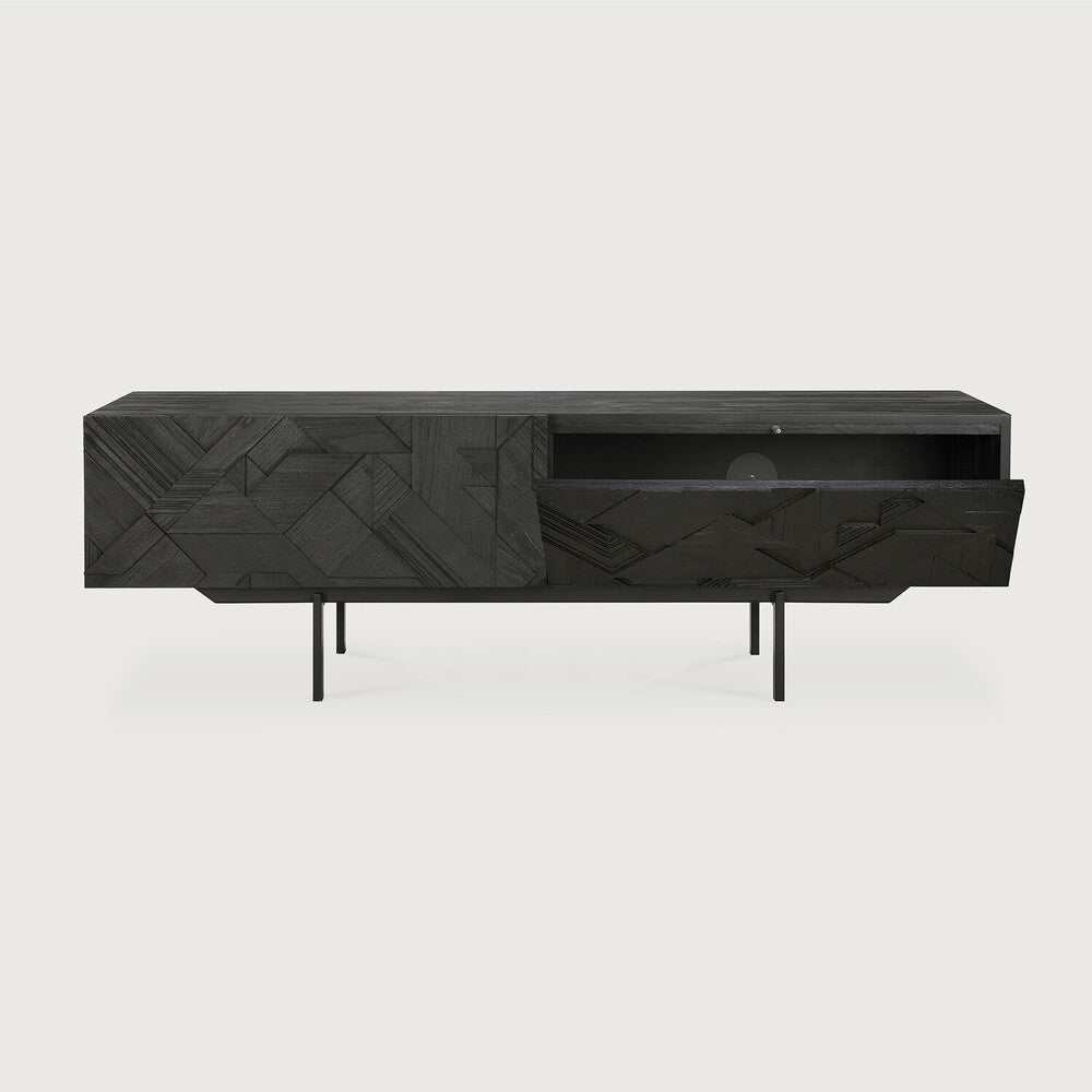 Featuring Graphic TV Cupboard by Ethnicraft at Amethyst Home. In his quest to add movement to the surface, our designer Alain van Havre started layering and combining triangular shapes. Before he knew it, he had created an interesting composition out of teak. Originally used for our popular Teak Graphic sideboard, the pattern now translates perfectly to a new TV cupboard.
This Graphic TV c. Amethyst Home provides interior design services, furniture, rugs, and lighting in the Scottsdale metro area.