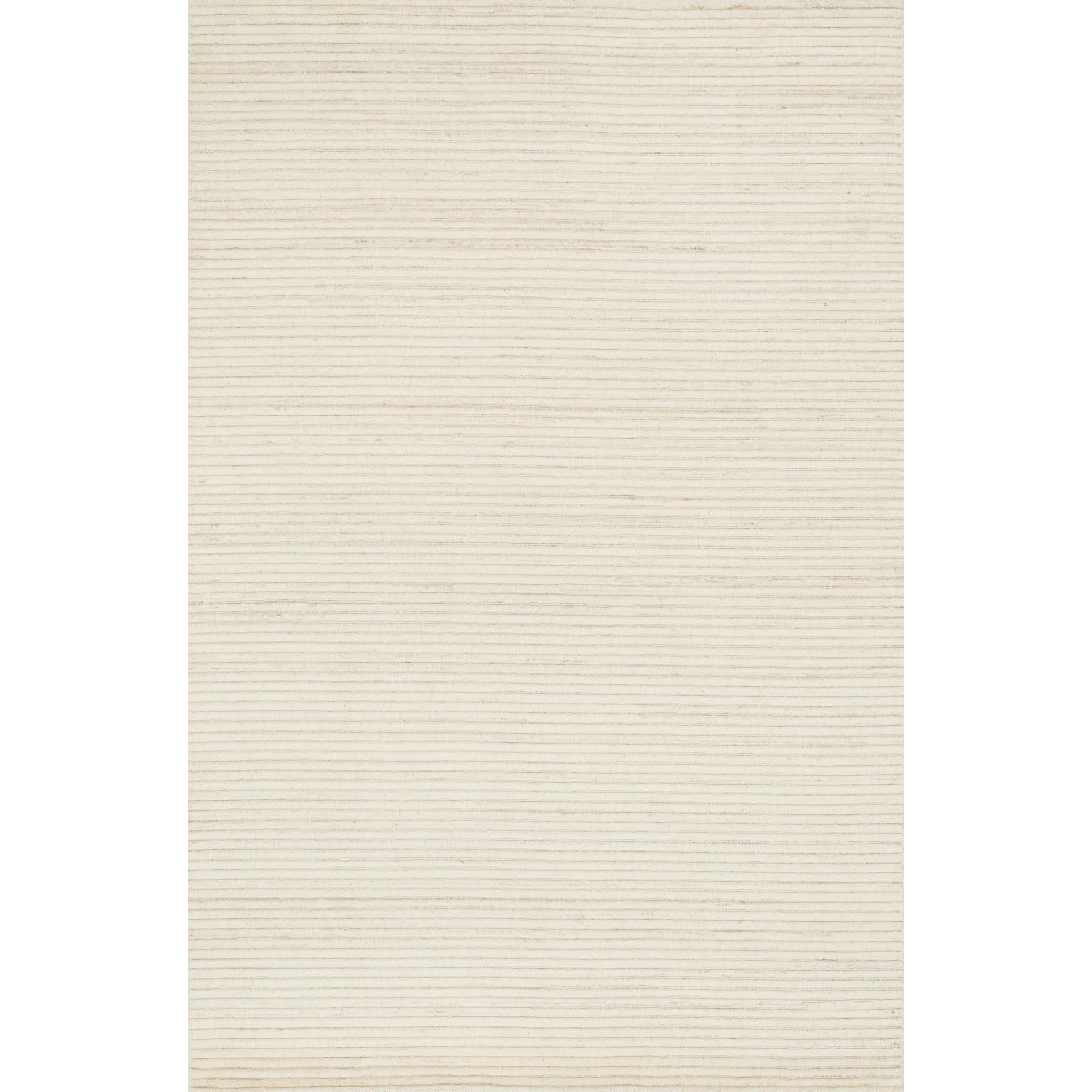 Hadley Ivory Rug - Amethyst Home Natural beauty is expressed in an understated fashion with the Hadley Collection, an eco-friendly collection of 100% undyed wool. Loom knotted, the Hadley features an intriguing cut pile and loop combination which adds distinctive texture to these handsome and durable designs. Also, the muted colors fit easily with a variety of interior styles while still earning notice with raw elegance.