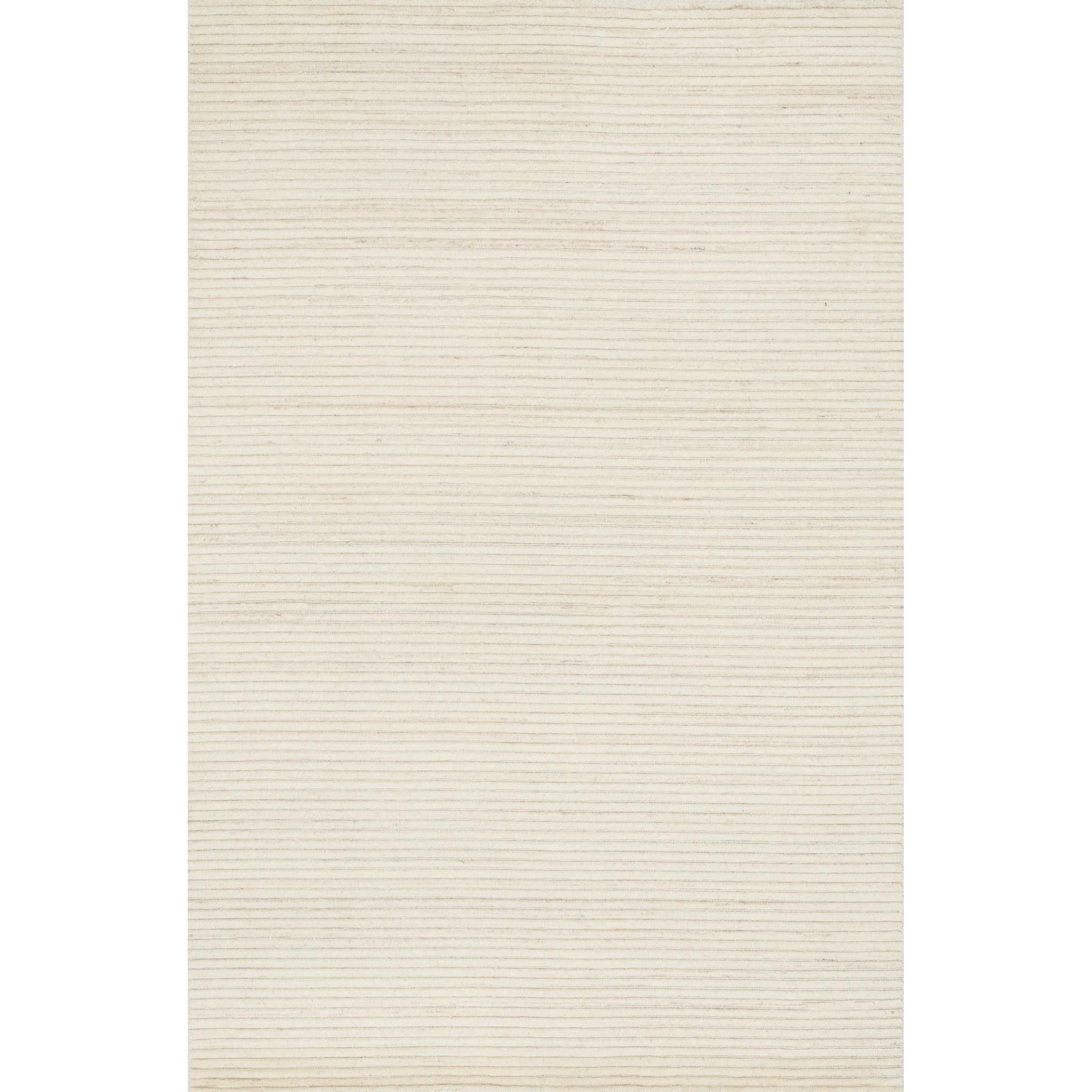 Hadley Ivory Rug - Amethyst Home Natural beauty is expressed in an understated fashion with the Hadley Collection, an eco-friendly collection of 100% undyed wool. Loom knotted, the Hadley features an intriguing cut pile and loop combination which adds distinctive texture to these handsome and durable designs. Also, the muted colors fit easily with a variety of interior styles while still earning notice with raw elegance.