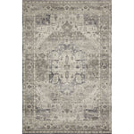 Featuring soft motifs in a carefully curated color palate of grey, black, ivory and hints of blue, the Hathaway Steel / Ivory area rug captures the essence of one-of-a-kind vintage or antique area rug. This rug is ideal for high traffic areas such as living rooms, dining rooms, kitchens, hallways, and entryways.