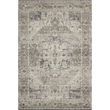 Featuring soft motifs in a carefully curated color palate of grey, black, ivory and hints of blue, the Hathaway Steel / Ivory area rug captures the essence of one-of-a-kind vintage or antique area rug. This rug is ideal for high traffic areas such as living rooms, dining rooms, kitchens, hallways, and entryways.