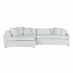 Featuring Harbor 2 Piece Sectional by Cisco Brothers at Amethyst Home. A chic, yet simple design, the Gunner Upholstered Sofa by Cisco Brothers boasts a streamlined frame supported by tapered legs. This sofa is beautifully detailed, with piping on the body and top stitch on cushions. It has a traditional yet sleek look, ideal for entertaining.  Photograph.  Amethyst Home provides interior design, new home construction design consulting, vintage area rugs, and lighting in the Washington metro area.
