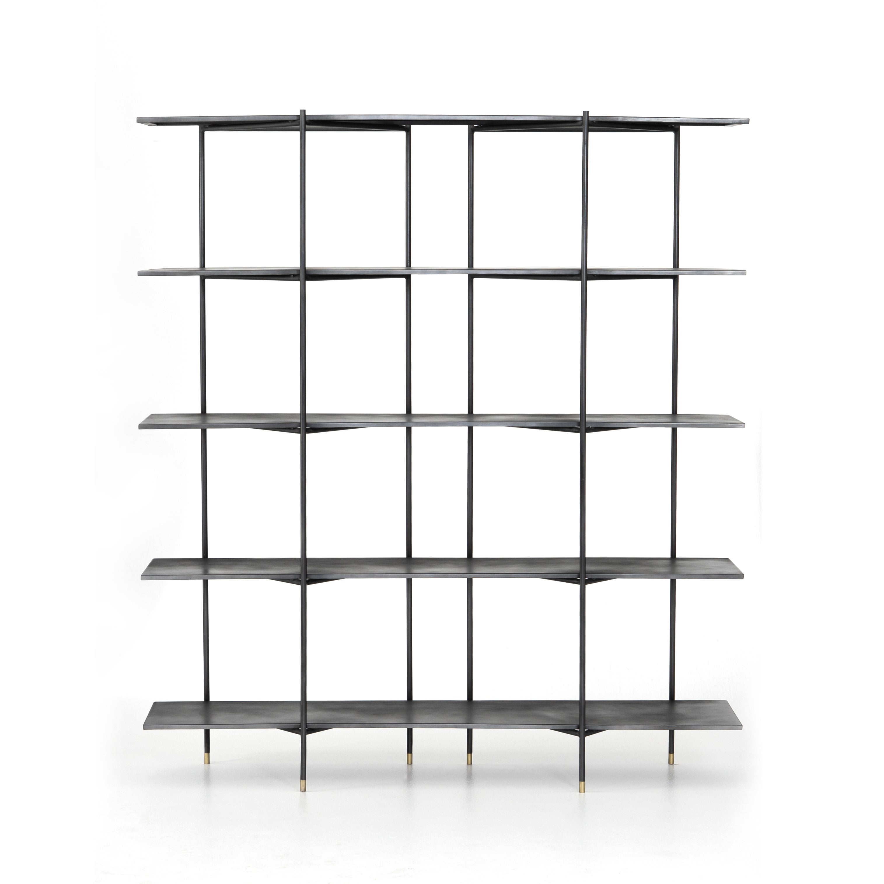Modern industrial design gets softened by fine lines with this Vito Bookshelf. Wide planks of distressed iron offer plenty of space for the display of books and treasured items. Brass-capped feet add a feminine finishing touch.  Available September 2020!  Overall Dimensions: 63"w x 16.5"d x 71"h Materials: Iron
