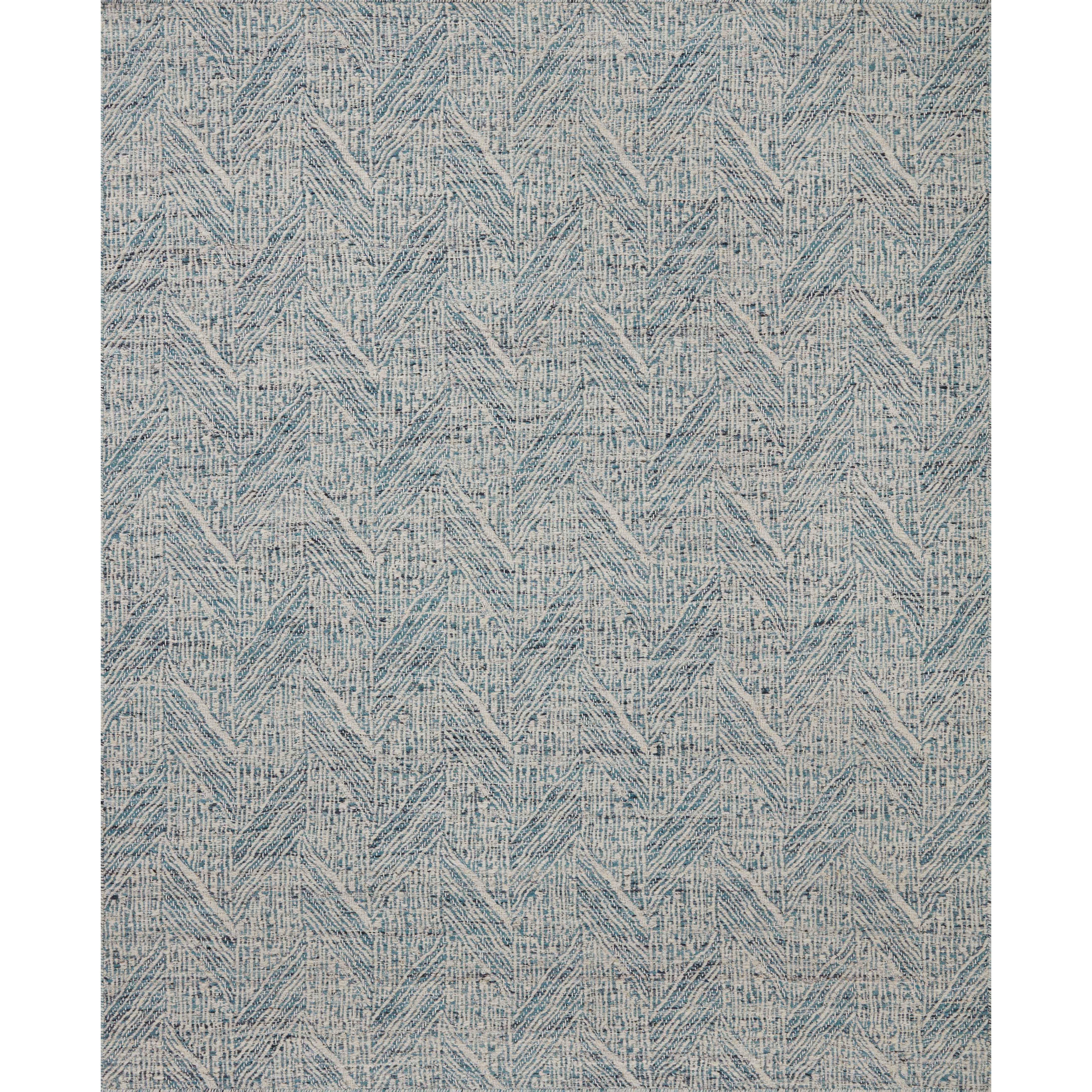 The Raven Blue / Ivory Rug is intricately handwoven with delicate, fine yarns that amplify the rug's layered and dimensional geometric design. While the rug itself is thick and sturdy, the colors and patterns have a casual lightness that can work in many spaces, from busy living rooms to serene bedrooms. Amethyst Home provides interior design, new construction, custom furniture, and area rugs in the Laguna Beach metro area.