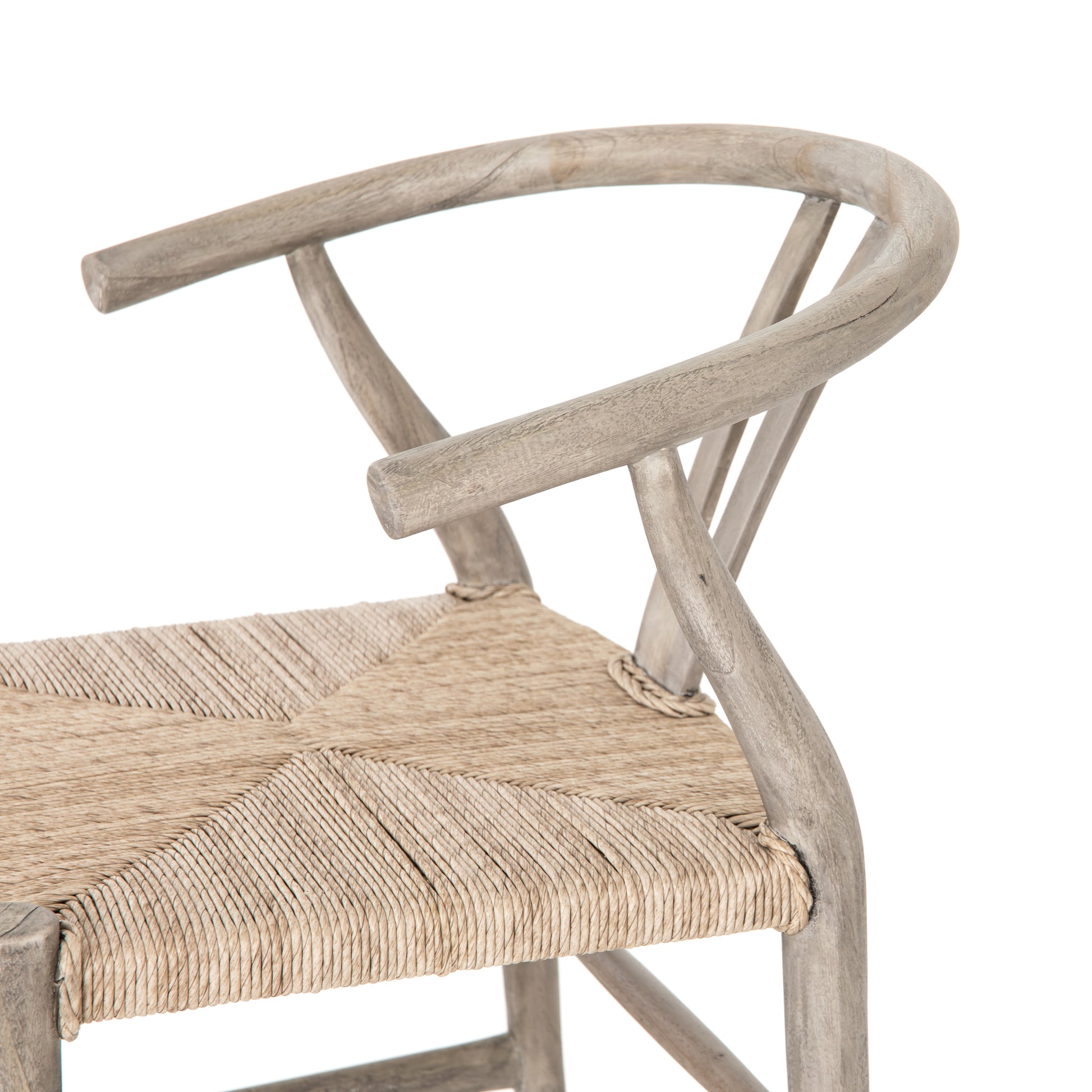 Modern curves redefine the classic wishbone-style counter stool. Vintage white all-weather wicker is woven for a dose of fresh texture within weathered grey teak framing. Cover or store indoors during inclement weather and when not in use.  Pictured in Weathered Grey. Also available in Black Teak and Matte Sealed Teak.  Overall Size: 21.50"w x 22.50"d x 38.50"h Seat Depth: 18.25" Seat Height: 26.50"