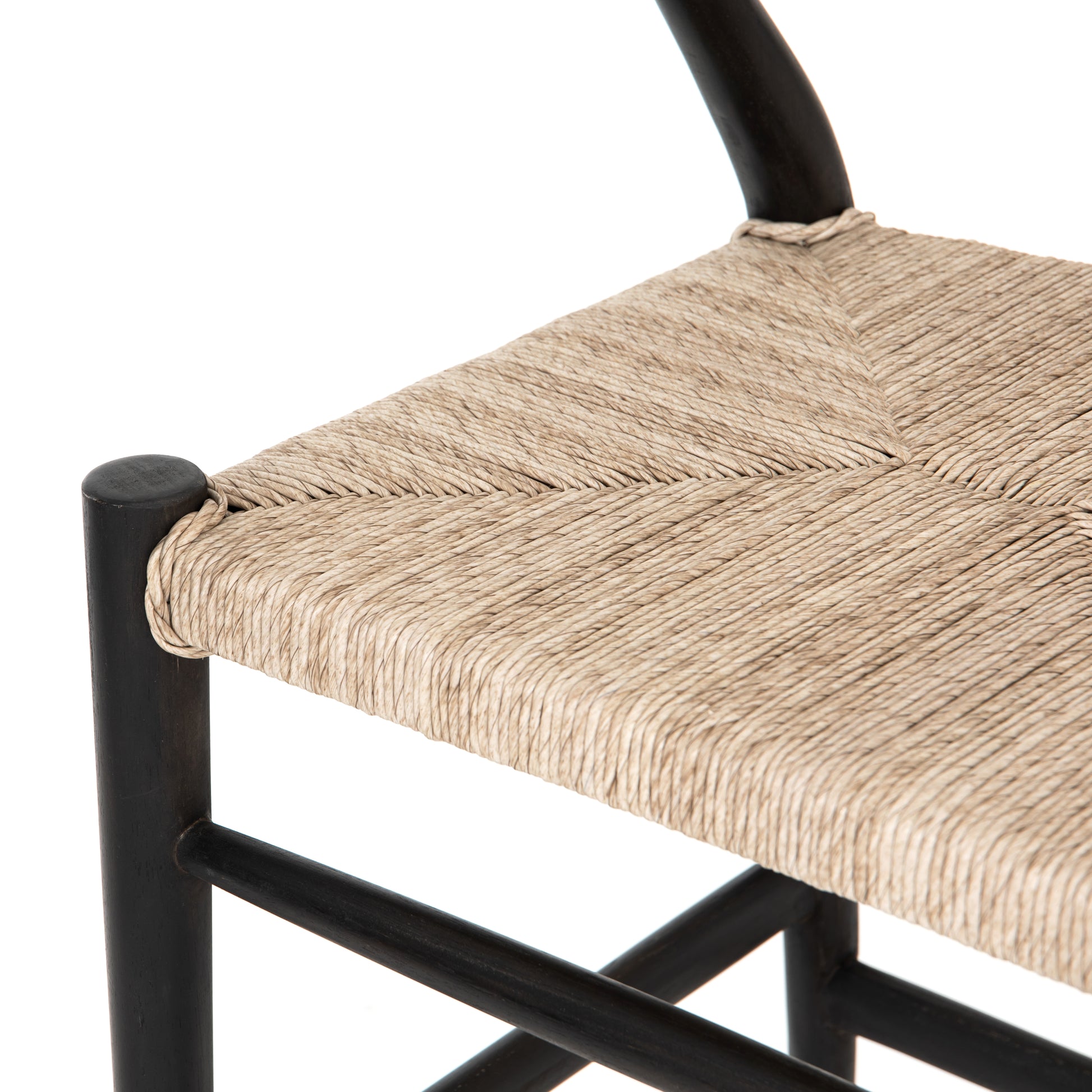 Modern curves redefine the classic wishbone-style counter stool. Vintage white all-weather wicker is woven for a dose of fresh texture within weathered grey teak framing. Cover or store indoors during inclement weather and when not in use.  Pictured in Black Teak. Also available in Weathered Grey and Matte Sealed Teak.  Overall Size: 21.50"w x 22.50"d x 38.50"h Seat Depth: 18.25" Seat Height: 26.50"
