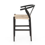 Featuring Muestra Counter + Bar Stool - Black Teak by Four Hands at Amethyst Home. Modern curves redefine the classic wishbone-style of this Muestra Black Teak Counter + Bar Stool. Vintage white all-weather wicker is woven for a dose of fresh texture within weathered grey teak framing. Cover or store indoors during inclement weather and when not in use.
Coun.  Amethyst Home provides interior design, new home construction design consulting, vintage area rugs, and lighting in the Houston metro area.