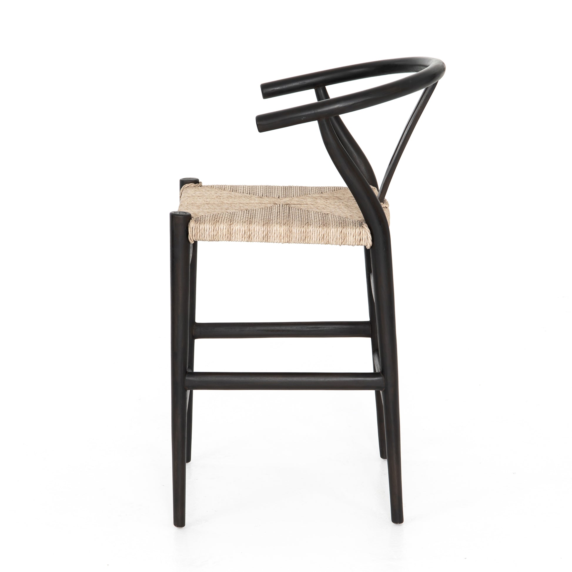 Modern curves redefine the classic wishbone-style counter stool. Vintage white all-weather wicker is woven for a dose of fresh texture within weathered grey teak framing. Cover or store indoors during inclement weather and when not in use.  Pictured in Black Teak. Also available in Weathered Grey and Matte Sealed Teak.  Overall Size: 21.50"w x 22.50"d x 38.50"h Seat Depth: 18.25" Seat Height: 26.50"