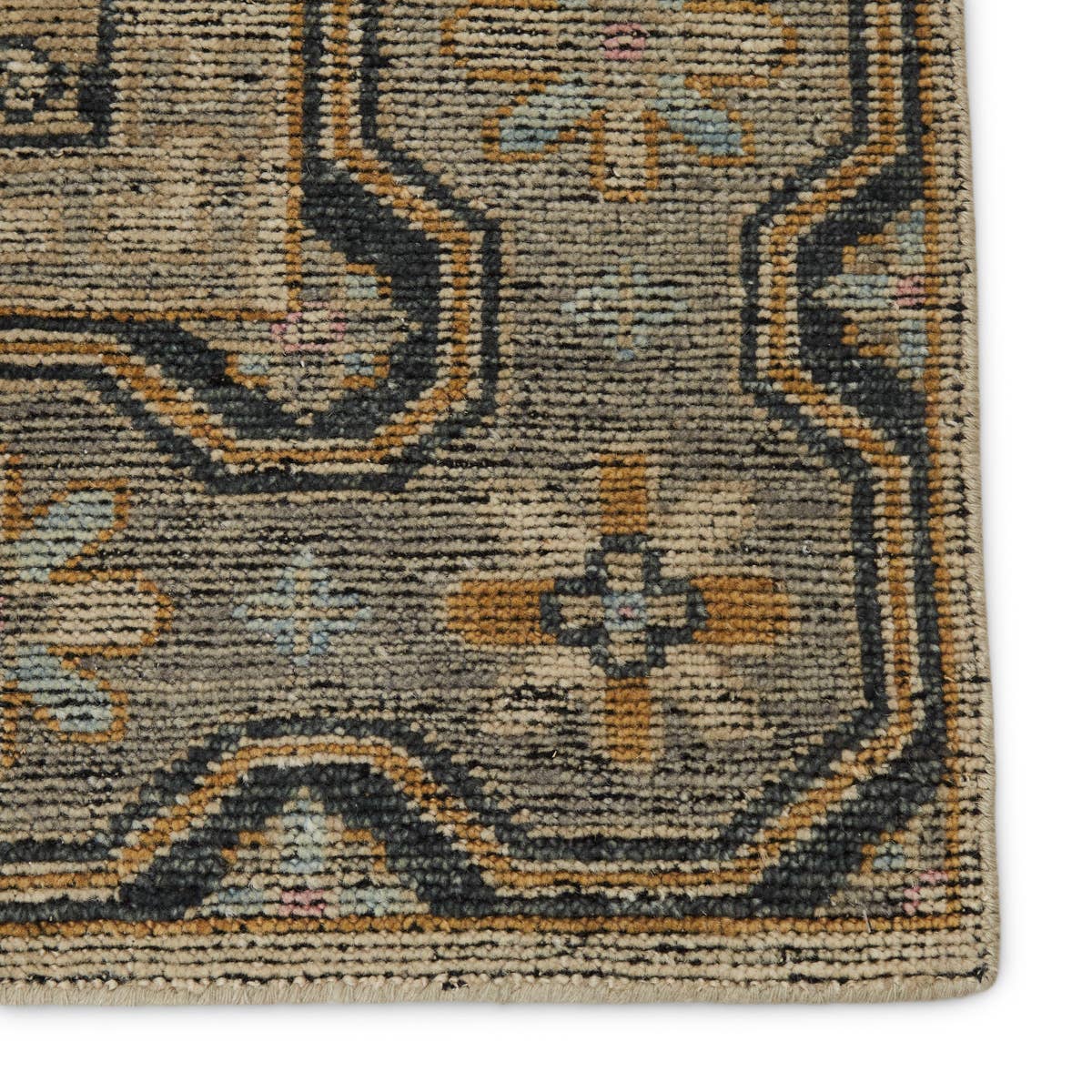 The Rhapsody Delpha Area Rug by Jaipur Living, or RHA05, boasts a beautiful medallion motif with a tile-like, decorative border detail. The light ivory tone is accented with rich green-blue, ochre, and sky blue hues. This durable wool hand knotted rug is perfect for the living room or other high traffic areas. 