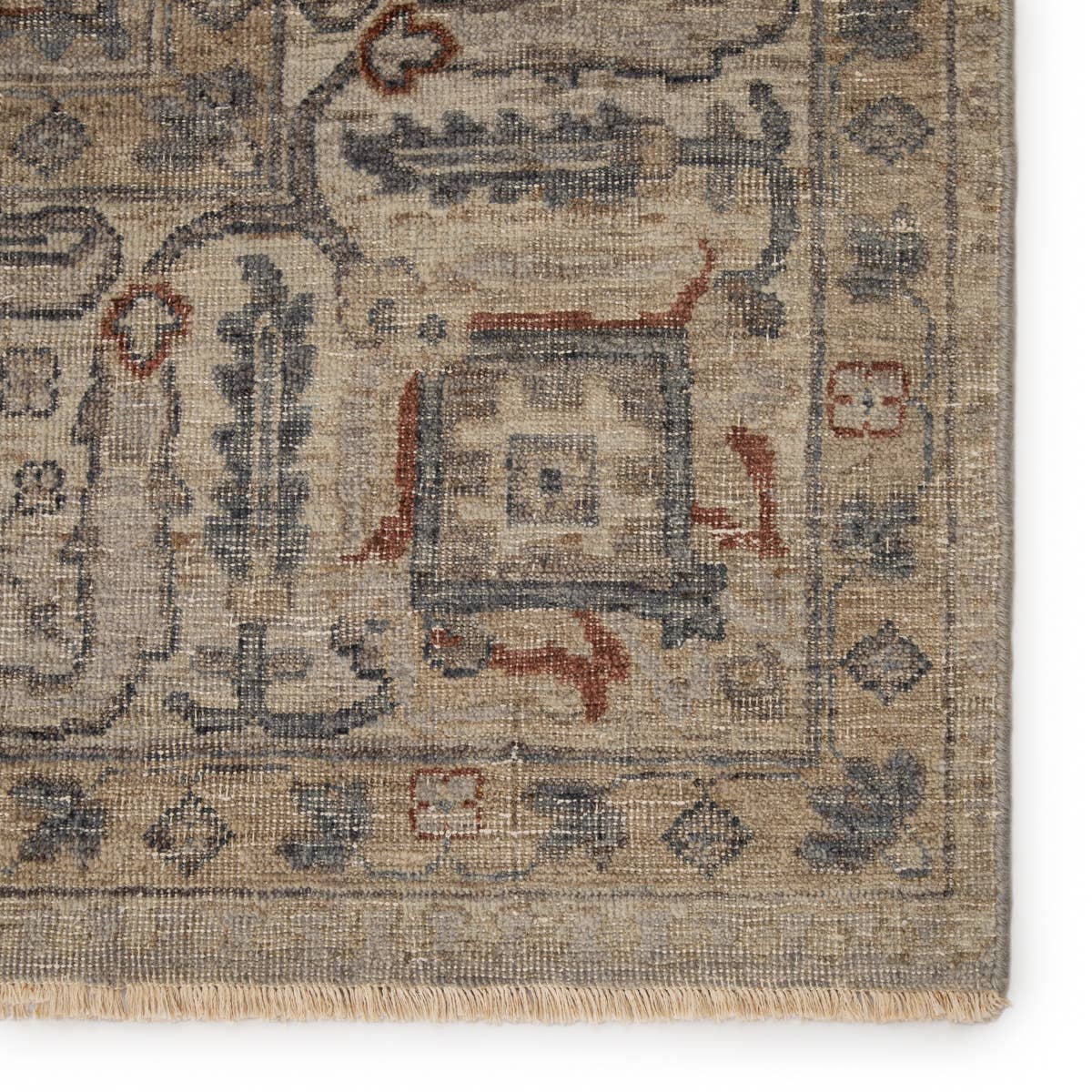 The Tierzah Maison Area Rug by Jaipur Living, or TRZ04, boasts a Persian knot construction and neutral beige, taupe, and gray palette with rich hints of terracotta. This artisan-made rug features fringe trimmed details for a touch of global charm. This is perfect for your bedroom or other medium traffic area. 