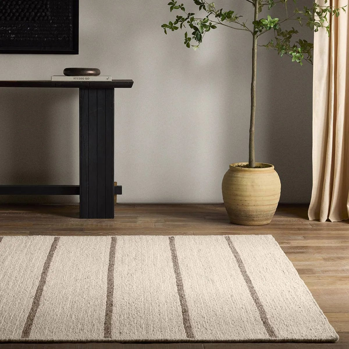 With its mesmerizing waves of 100% premium undyed artisanal wool, Norfolk adds an earthy, elemental ease to any modern interior. In unique combinations of creams and browns, the weaver’s impromptu selection of undyed yarn results in unexpected flecks of gray. Enjoy effortless style, and unsurpassed craftsmanship.Hand Tufte Amethyst Home provides interior design, new home construction design consulting, vintage area rugs, and lighting in the Calabasas metro area.