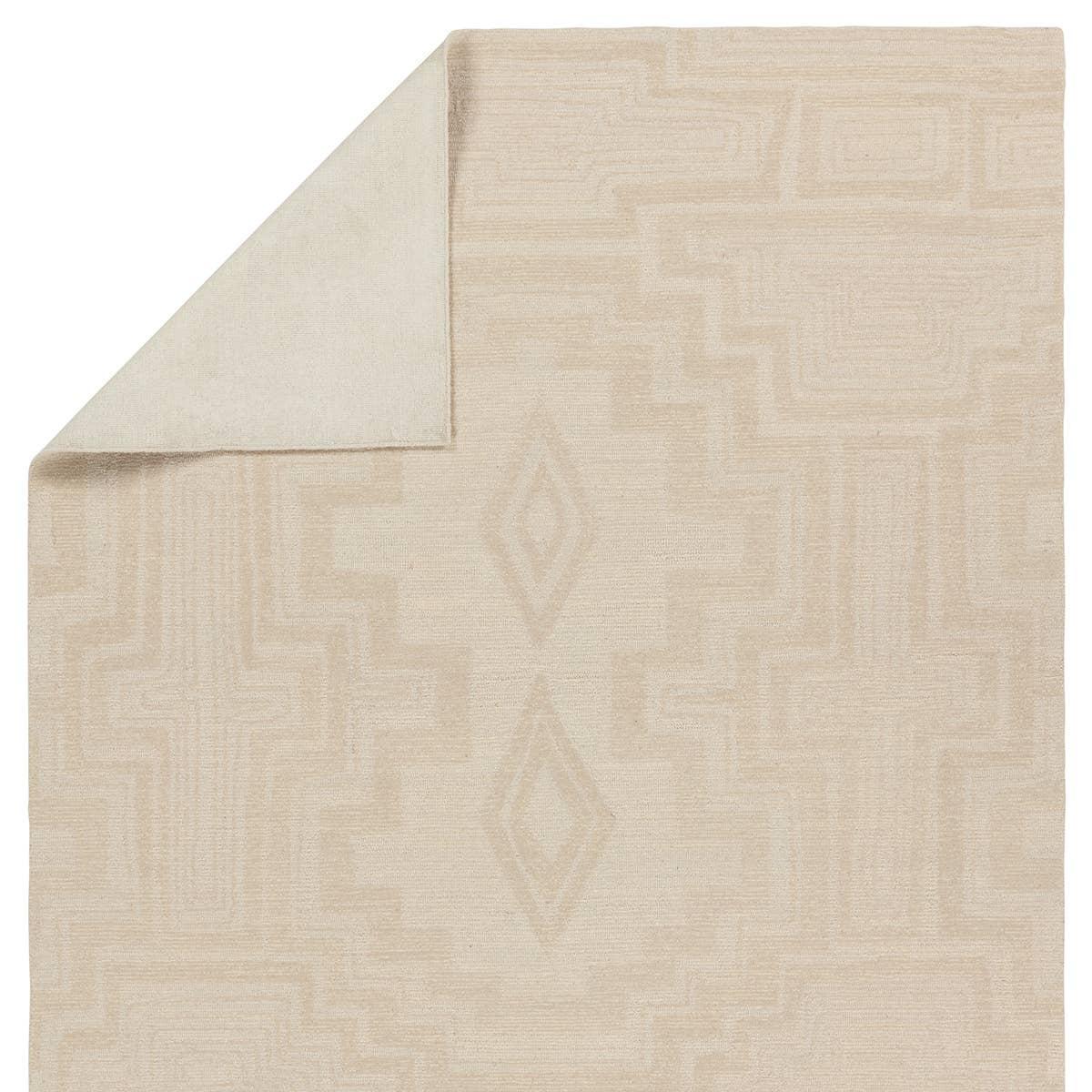 The hand-tufted Cardamom Aterian boasts vivid jewel tones and uniquely distressed Turkish motifs, crafted to emulate traditional sun-faded, vintage designs. The Aterian rug showcases an open medallion and geometric motif in a natural palette of light gray and cream. Amethyst Home provides interior design, new home construction design consulting, vintage area rugs, and lighting in the Calabasas metro area.