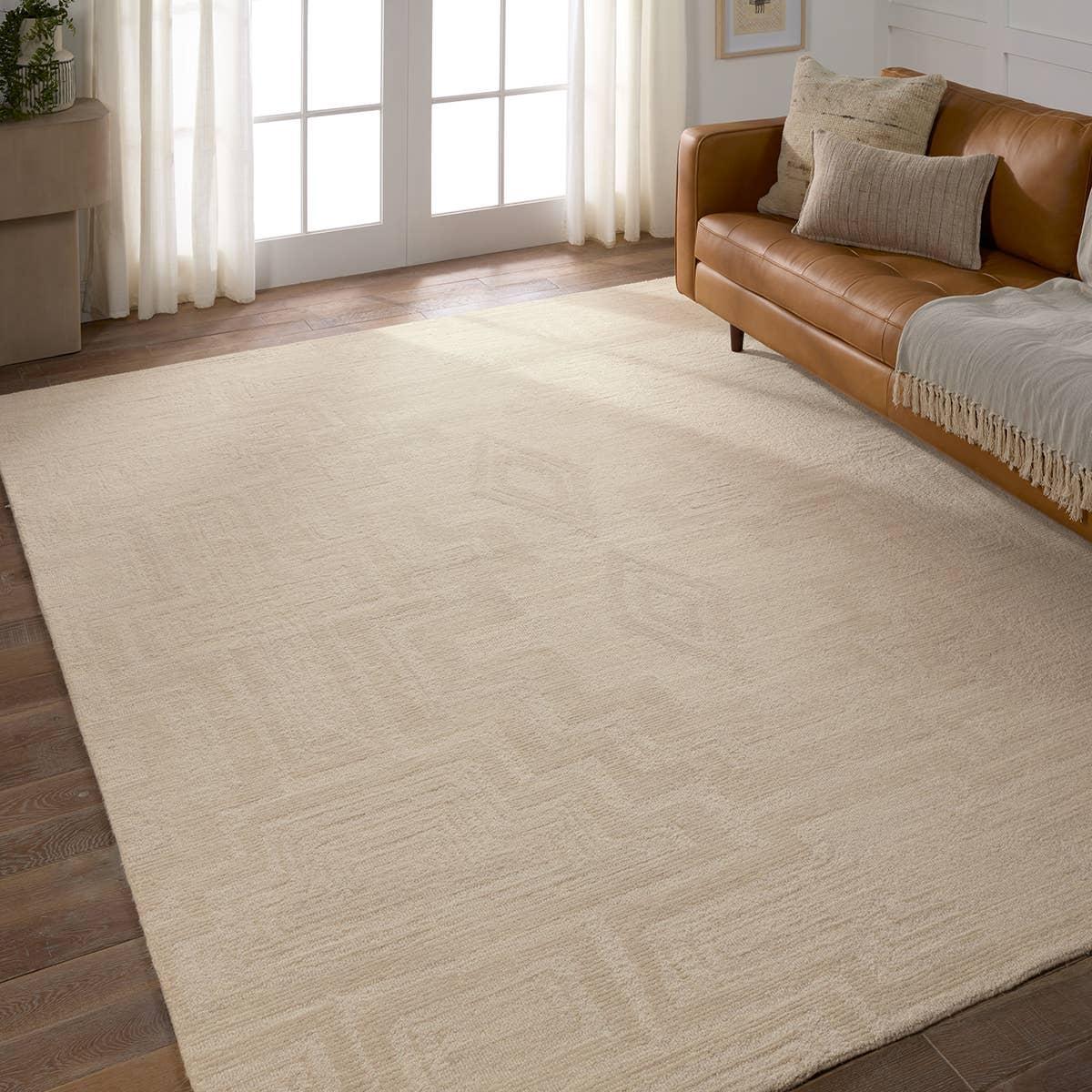 The hand-tufted Cardamom Aterian boasts vivid jewel tones and uniquely distressed Turkish motifs, crafted to emulate traditional sun-faded, vintage designs. The Aterian rug showcases an open medallion and geometric motif in a natural palette of light gray and cream. Amethyst Home provides interior design, new home construction design consulting, vintage area rugs, and lighting in the Laguna Beach metro area.