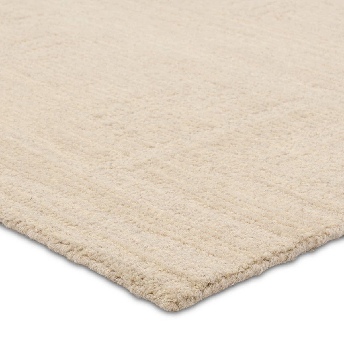 The hand-tufted Cardamom Aterian boasts vivid jewel tones and uniquely distressed Turkish motifs, crafted to emulate traditional sun-faded, vintage designs. The Aterian rug showcases an open medallion and geometric motif in a natural palette of light gray and cream. Amethyst Home provides interior design, new home construction design consulting, vintage area rugs, and lighting in the Los Angeles metro area.