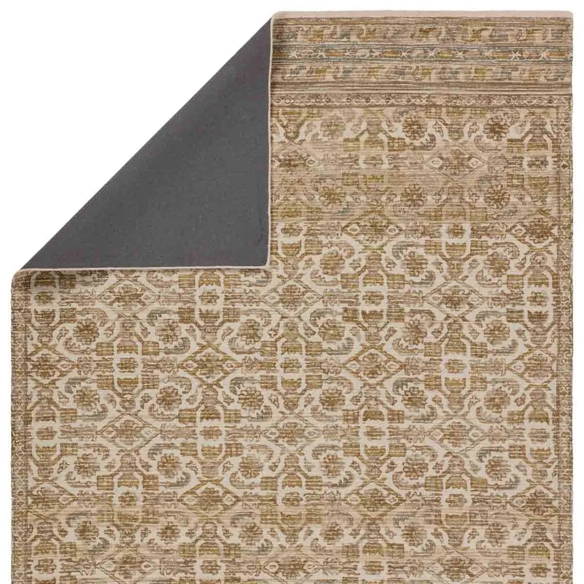 The hand-tufted Cardamom Sarang boasts vivid jewel tones and uniquely distressed Turkish motifs, crafted to emulate traditional sun-faded, vintage designs. The Sarang rug showcases a floral trellis motif in a mix of warm and earthy hues including brown, gold, cream, beige, and hints of blue. Amethyst Home provides interior design, new home construction design consulting, vintage area rugs, and lighting in the Alpharetta metro area.