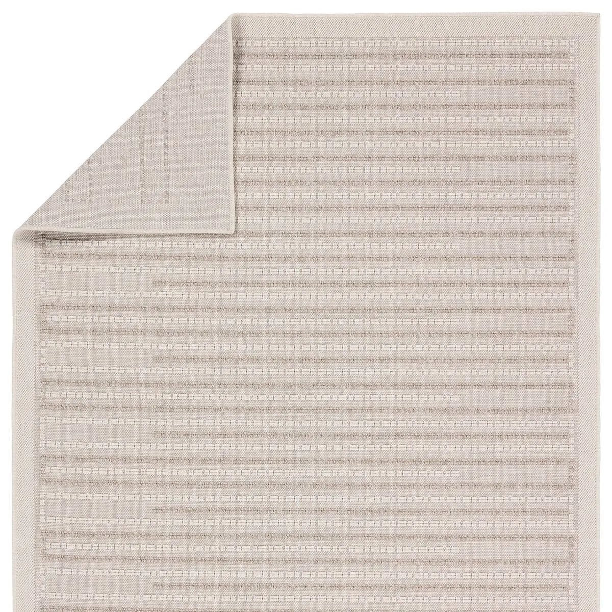 The Continuum collection brings the classic sisal look to outdoor spaces and high-traffic indoor areas. The soft Axiom design features an abstract, geometric pattern with cream high-low pile for added dimension. The polypropylene fibers are stain and water resistant for an easy-care accent piece that suits any area of the home Amethyst Home provides interior design, new home construction design consulting, vintage area rugs, and lighting in the Winter Garden metro area.
