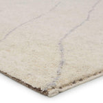 Featuring Indira Laverna Hand-Knotted Rug by Jaipur Living at Amethyst Home. Rich in detail and plush underfoot, the Indira Laverna is made up of neutral-toned modern Moroccan styles. The Laverna area rug features a slight sheen and luxurious hand-knotted construction of natural wool and viscose. A light trellis design provides geometric interest in a silve. Amethyst Home provides interior design, new home construction design consulting, vintage area rugs, and lighting in the Calabasas metro area.