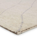 Featuring Indira Laverna Hand-Knotted Rug by Jaipur Living at Amethyst Home. Rich in detail and plush underfoot, the Indira Laverna is made up of neutral-toned modern Moroccan styles. The Laverna area rug features a slight sheen and luxurious hand-knotted construction of natural wool and viscose. A light trellis design provides geometric interest in a silve. Amethyst Home provides interior design, new home construction design consulting, vintage area rugs, and lighting in the Calabasas metro area.