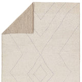 Featuring Indira Laverna Hand-Knotted Rug by Jaipur Living at Amethyst Home. Rich in detail and plush underfoot, the Indira Laverna is made up of neutral-toned modern Moroccan styles. The Laverna area rug features a slight sheen and luxurious hand-knotted construction of natural wool and viscose. A light trellis design provides geometric interest in a silver. Amethyst Home provides interior design, new home construction design consulting, vintage area rugs, and lighting in the Portland metro area.