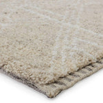 Featuring Indira Merida Hand-Knotted Rug by Jaipur Living at Amethyst Home. Rich in detail and plush underfoot, the Indira Merida is made up of neutral-toned modern Moroccan styles. The Merida area rug features a slight sheen and luxurious hand-knotted construction of natural wool and viscose. A distressed trellis design provides geometric interest in an. Amethyst Home provides interior design, new home construction design consulting, vintage area rugs, and lighting in the Laguna Beach metro area.