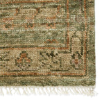 The hand-knotted Jinsen Augusta features a fresh incarnation of the vintage Turkish textile look. Classic in pattern and modern in color, the Augusta rug boasts a beautiful palette of green, burnished gold, and hints of taupe featuring distinct dye-lot details and subtle fringe. Amethyst Home provides interior design, new home construction design consulting, vintage area rugs, and lighting in the Charlotte metro area.