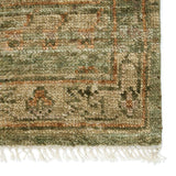 The hand-knotted Jinsen Augusta features a fresh incarnation of the vintage Turkish textile look. Classic in pattern and modern in color, the Augusta rug boasts a beautiful palette of green, burnished gold, and hints of taupe featuring distinct dye-lot details and subtle fringe. Amethyst Home provides interior design, new home construction design consulting, vintage area rugs, and lighting in the Charlotte metro area.