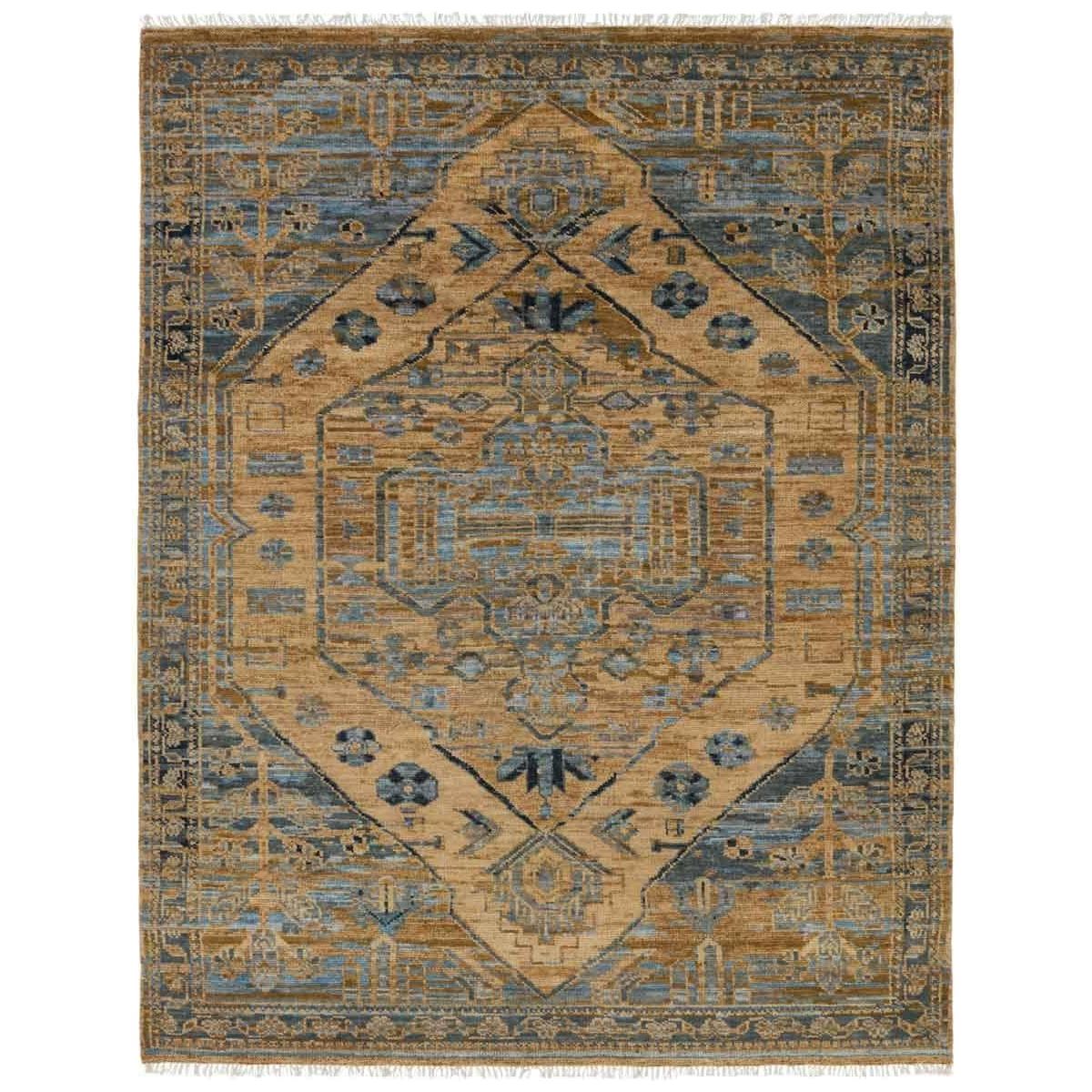 The hand-knotted Jinsen Fontane features a fresh incarnation of the vintage Turkish textile look. Classic in pattern and modern in color, the Fontane rug boasts a beautiful palette of tan, blue, gold, and brown, featuring distinct dye-lot details and subtle fringe. Amethyst Home provides interior design, new home construction design consulting, vintage area rugs, and lighting in the Omaha metro area.