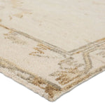 Featuring Jinsen Alamo Rug by Jaipur Living at Amethyst Home. The hand-knotted Jinsen collection features a fresh incarnation of the vintage Turkish textile look. Classic in pattern and modern in color, the Alamo rug boasts a beautiful palette of cream, beige, gold, and brown, featuring distinct dye-lot details and subtle fringe. This artisan-crafted med. Amethyst Home provides interior design, new home construction design consulting, vintage area rugs, and lighting in the Laguna Beach metro area.