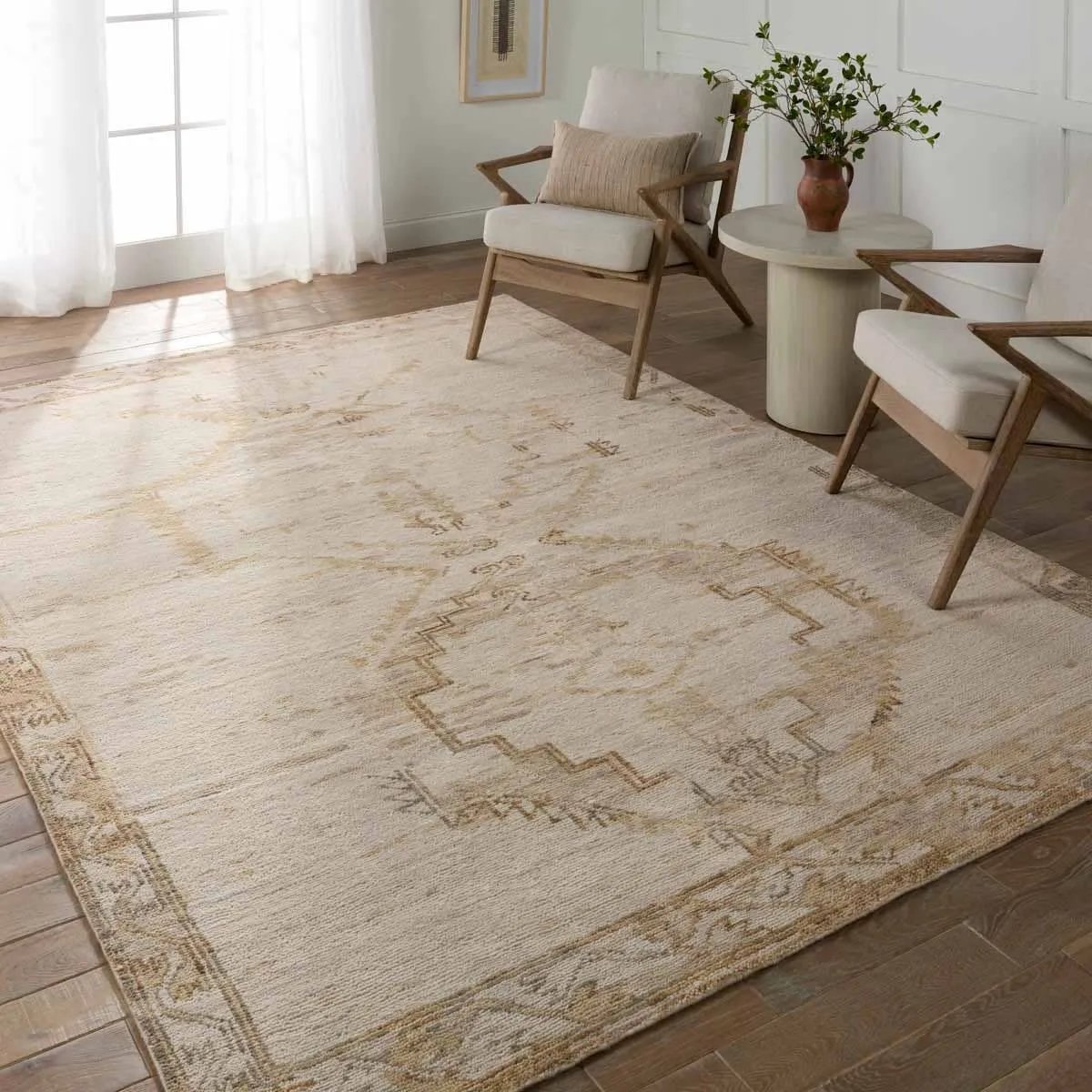 The hand-knotted Jinsen collection features a fresh incarnation of the vintage Turkish textile look. Classic in pattern and modern in color, the Alamo rug boasts a beautiful palette of cream, beige, gold, and brown, featuring distinct dye-lot details and subtle fringe. Amethyst Home provides interior design, new home construction design consulting, vintage area rugs, and lighting in the Nashville metro area.