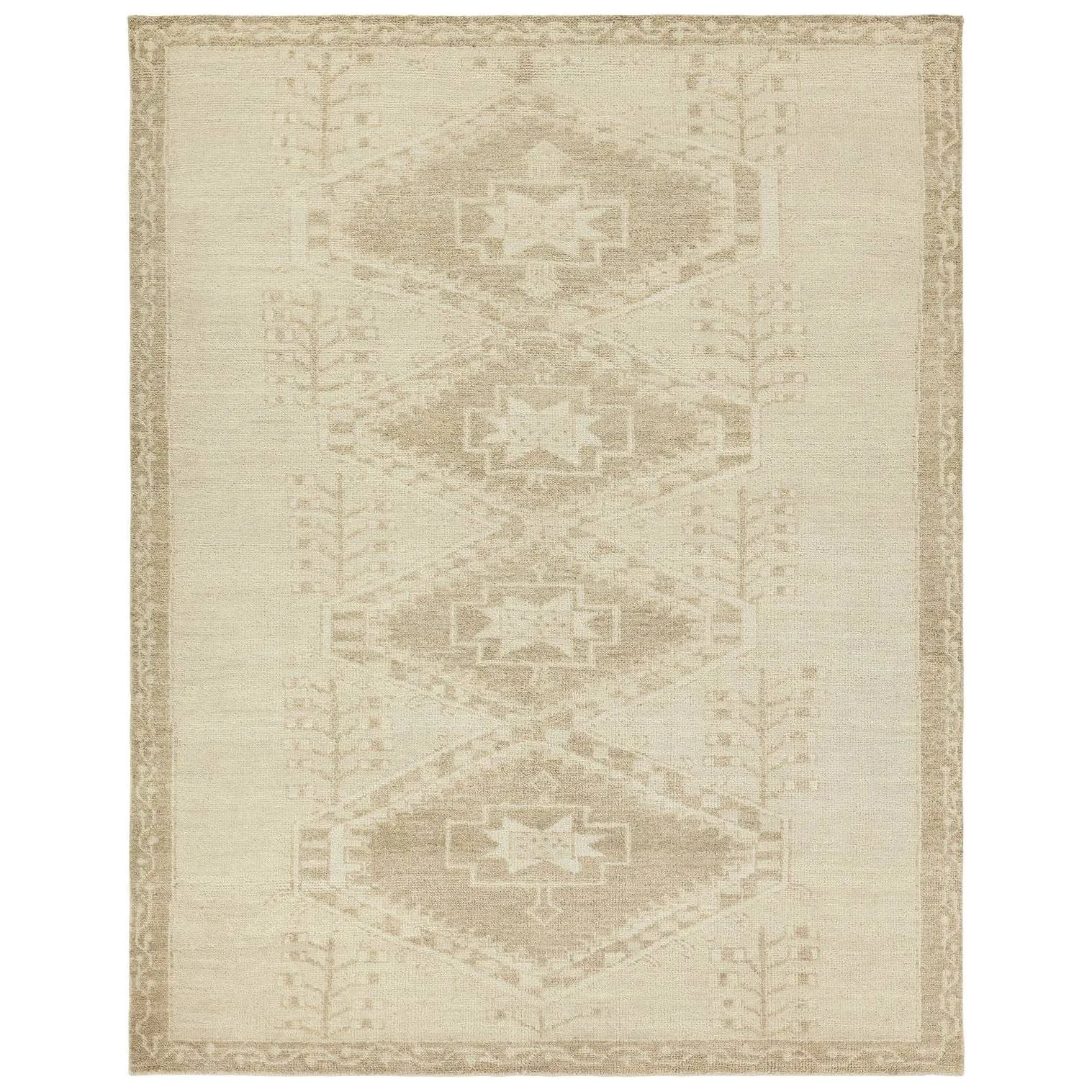 The hand-knotted Jinsen Ameen features a fresh incarnation of the vintage Turkish textile look. Classic in pattern and modern in color, the Ameen rug boasts a dusty desert and gray color palette and distinct dye-lot details. Amethyst Home provides interior design, new home construction design consulting, vintage area rugs, and lighting in the Portland metro area.