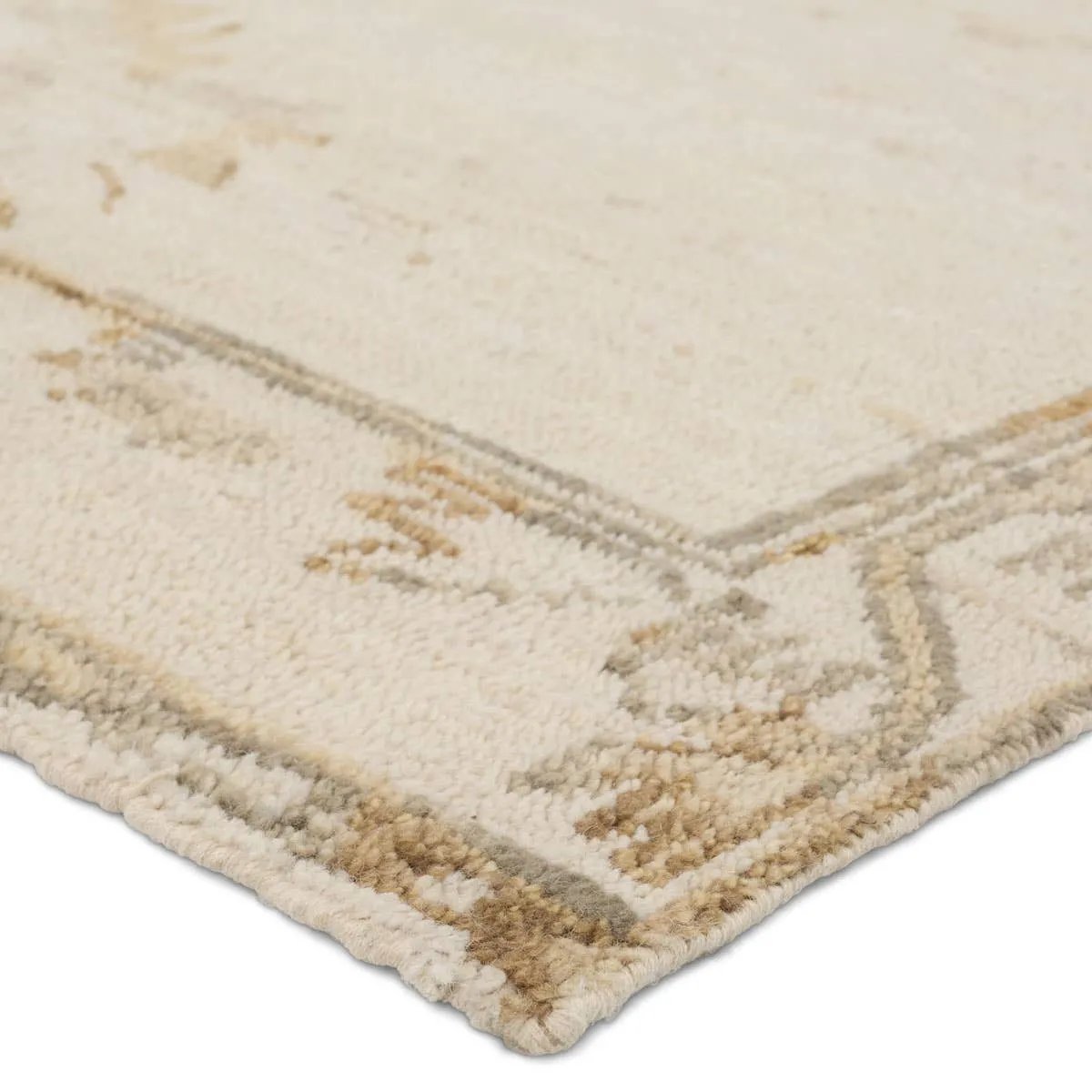 The hand-knotted Jinsen collection features a fresh incarnation of the vintage Turkish textile look. Classic in pattern and modern in color, the Alamo rug boasts a beautiful palette of cream, beige, gold, and brown, featuring distinct dye-lot details and subtle fringe. Amethyst Home provides interior design, new home construction design consulting, vintage area rugs, and lighting in the Scottsdale metro area.