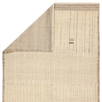 Full of texture, the handknotted Kazben Atalaya stuns with modern Moroccan patterns in natural hues. The Atalaya design delights with a gray and brown abstract-linear pattern on a cream base. A dotted border adds the finishing touches to this elevated accent piece. Low, ribbed pile creates visual intrigue and grounds any contemporary space. Amethyst Home provides interior design, new home construction design consulting, vintage area rugs, and lighting in the Charlotte metro area.