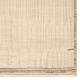 Full of texture, the handknotted Kazben Atalaya stuns with modern Moroccan patterns in natural hues. The Atalaya design delights with a gray and brown abstract-linear pattern on a cream base. A dotted border adds the finishing touches to this elevated accent piece. Low, ribbed pile creates visual intrigue and grounds any contemporary space. Amethyst Home provides interior design, new home construction design consulting, vintage area rugs, and lighting in the Dallas metro area.