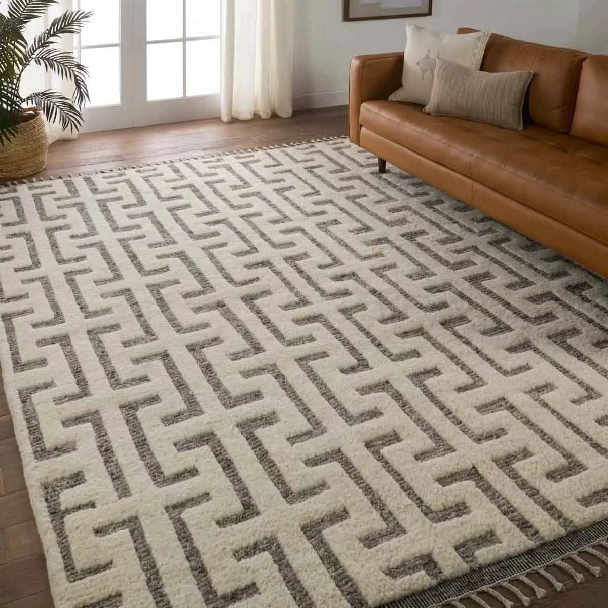 The Keoka Semra Rug boasts a fresh take on classic Afghani hand-knotted textiles. In rich, grounding tones of gray and ivory, the stylish contrast of the rug anchors room with bold yet neutral appeal. Amethyst Home provides interior design services, furniture, rugs, and lighting in the Kansas City metro area.