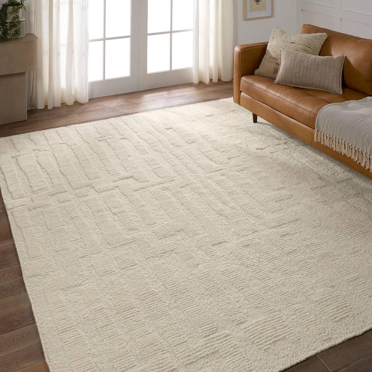 The Keoka Timandras boasts a fresh take on classic Afghani hand-knotted textiles. In the easy-to-decorate colorway of cream, the light and airy Timandra rug anchors rooms with versatility and neutral appeal. The texture-rich wool pile features a ribbed, high-low construction that lends unique linear details to the dynamic geometric patterns. Amethyst Home provides interior design, new home construction design consulting, vintage area rugs, and lighting in the Tampa metro area.