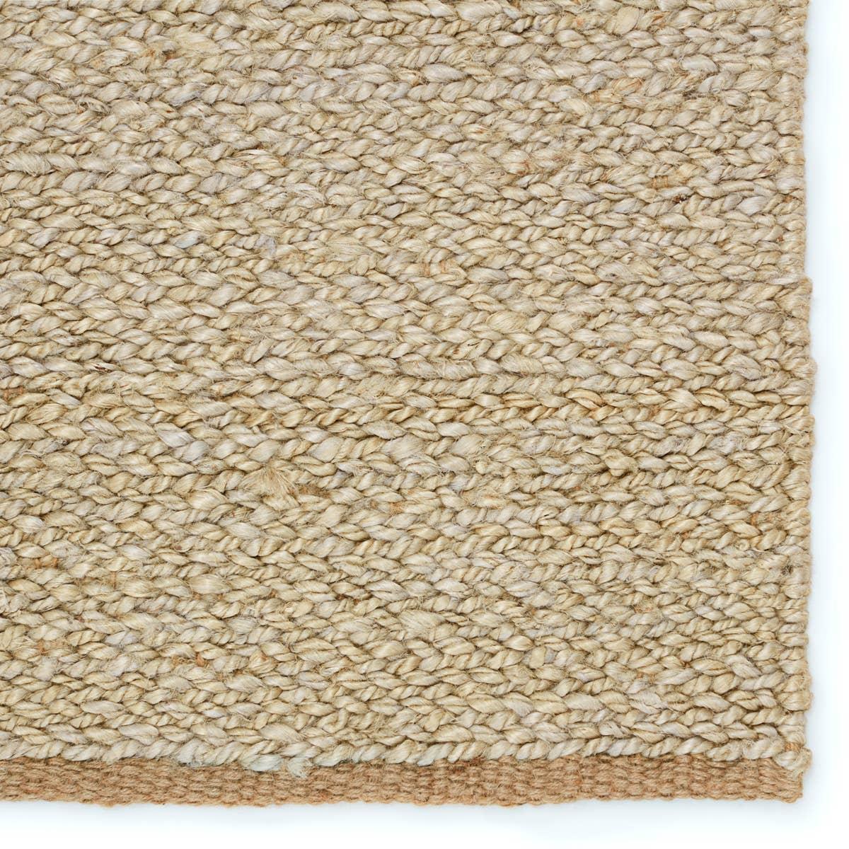 Simple and serene, the Laylani Murrel features handwoven natural fiber designs with tonal variation through the solid, chunky weave. The Murrel rug features a 100% jute make in an organic golden-brown colorway. A tightly woven border creates a beautiful finishing touch on this global accent piece. Amethyst Home provides interior design, new home construction design consulting, vintage area rugs, and lighting in the Los Angeles metro area.