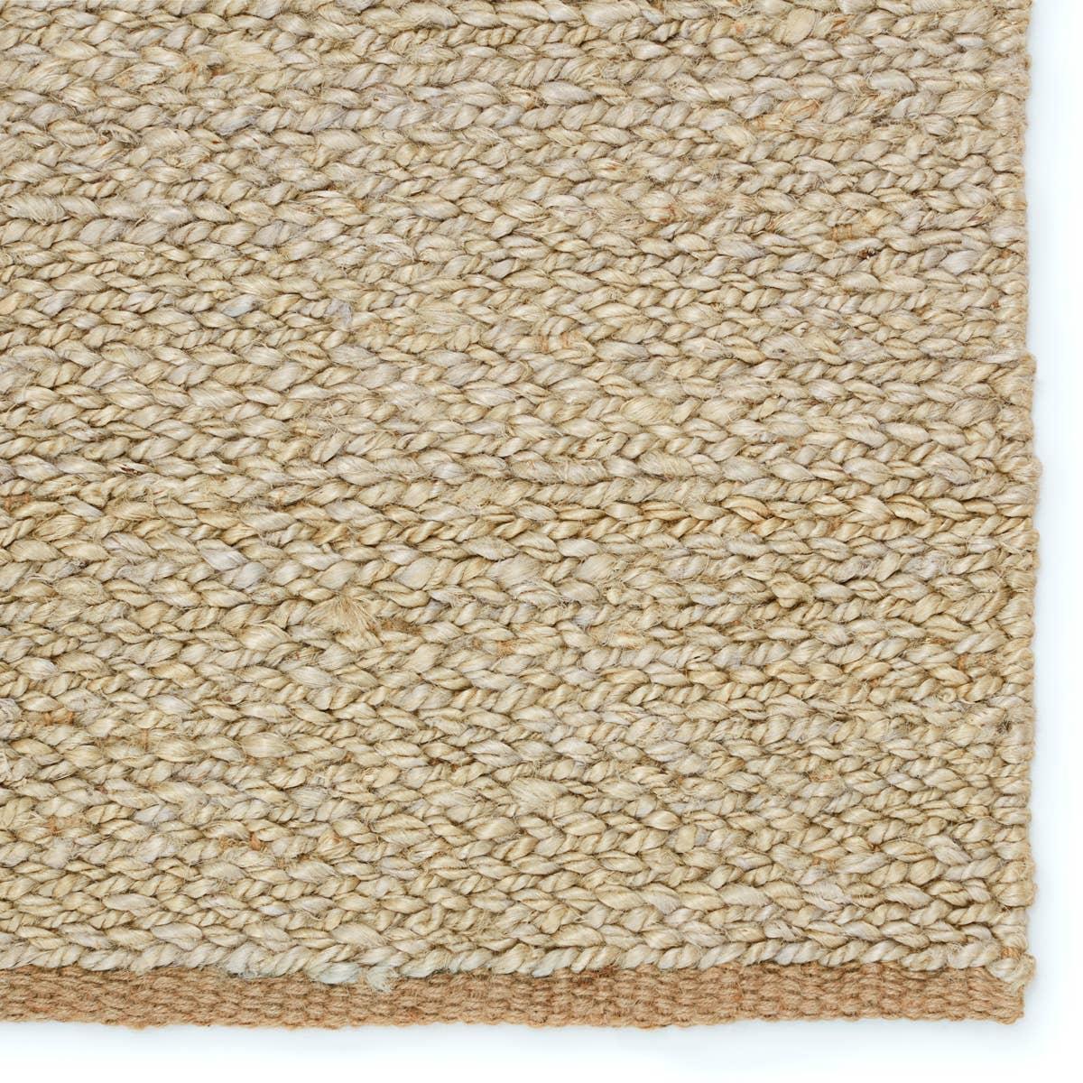 Simple and serene, the Laylani Murrel features handwoven natural fiber designs with tonal variation through the solid, chunky weave. The Murrel rug features a 100% jute make in an organic golden-brown colorway. A tightly woven border creates a beautiful finishing touch on this global accent piece. Amethyst Home provides interior design, new home construction design consulting, vintage area rugs, and lighting in the Los Angeles metro area.